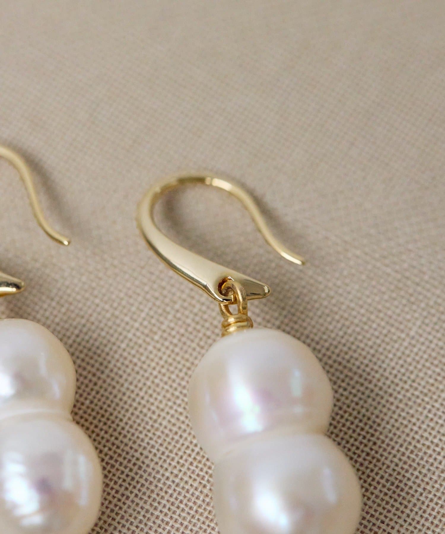 ear PAPILLONNER(イア パピヨネ) 《WEB＆一部店舗限定》雪だるまパールピアス