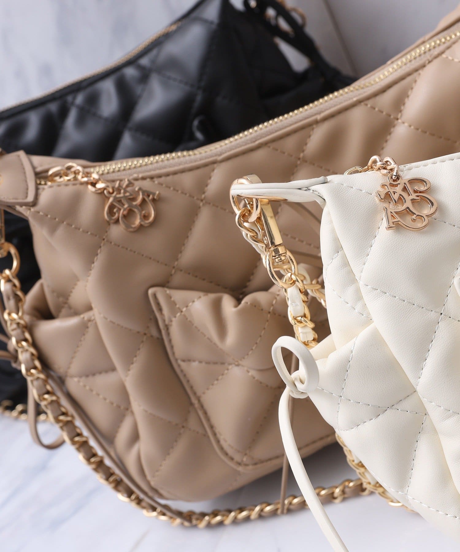 one after another NICE CLAUP(ワンアフターアナザー ナイスクラップ) キルティングリボンボーホーバッグ