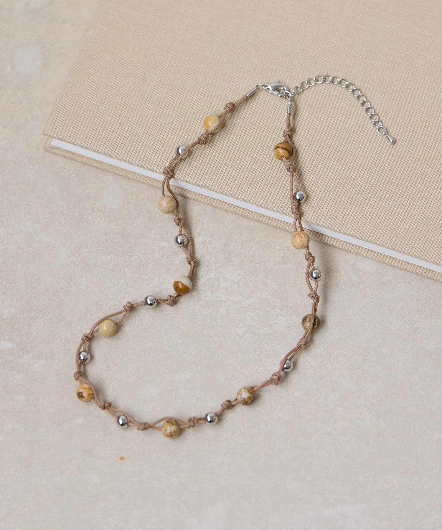 ear PAPILLONNER(イア パピヨネ) ロープ編みビーズネックレス