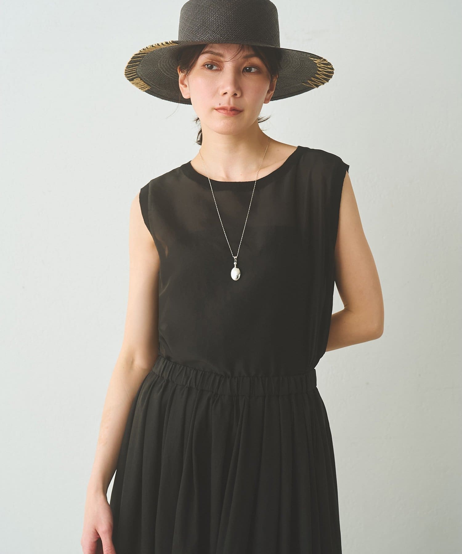 Whim Gazette(ウィム ガゼット) 【Drawing Numbers】シャイニーシースルーノースリーブブラウス