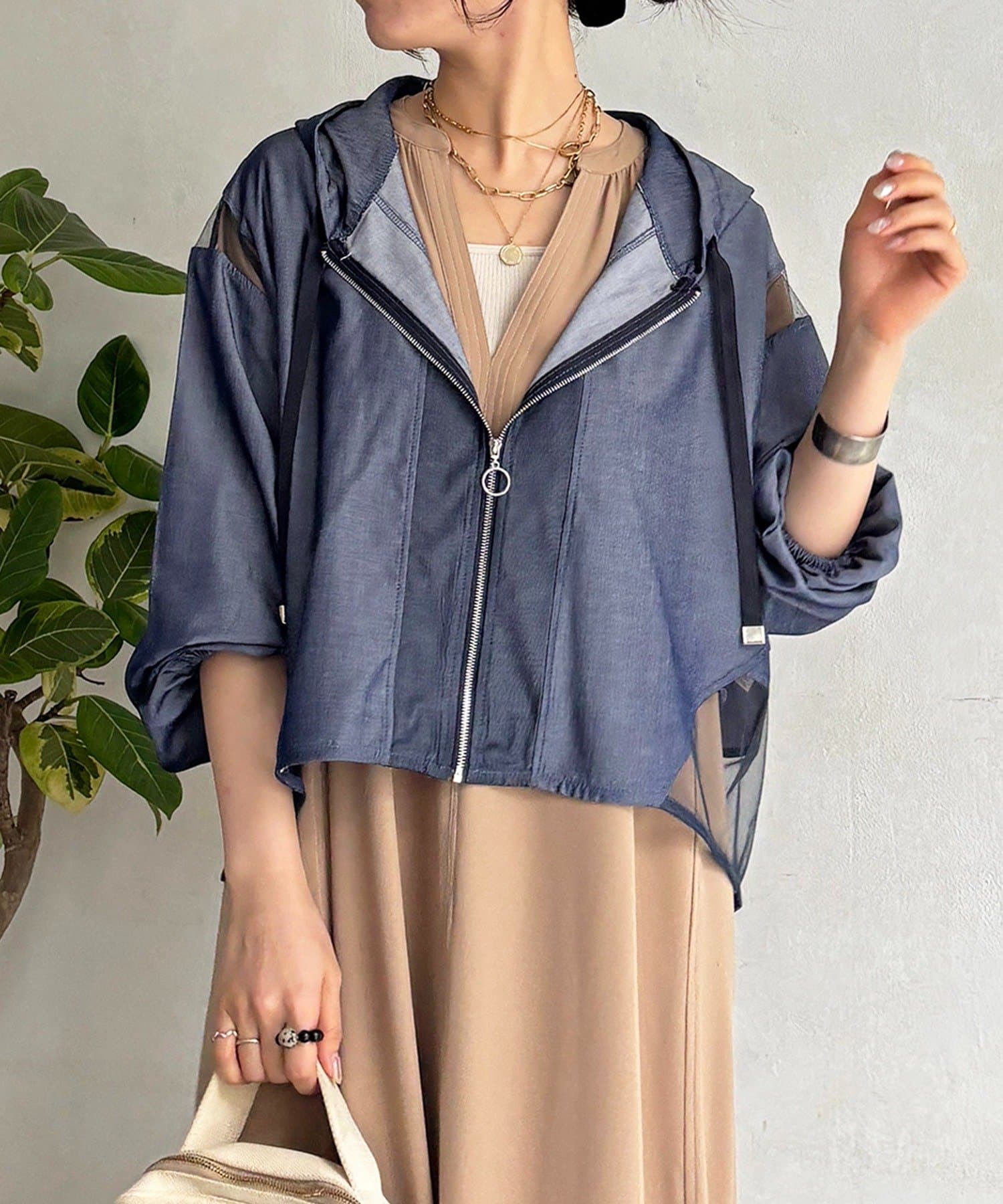 un dix cors(アンディコール) 光沢バイカラーフードブルゾン