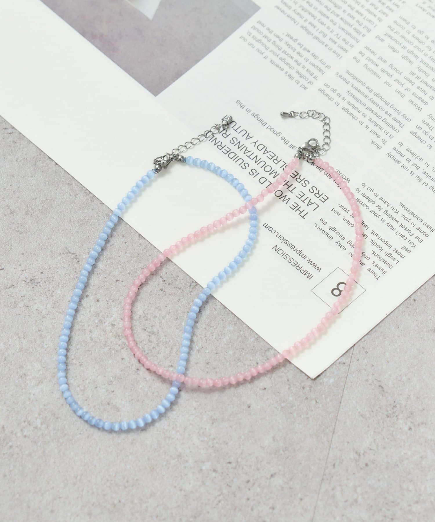 mysticのクリアカラービーズネックレス