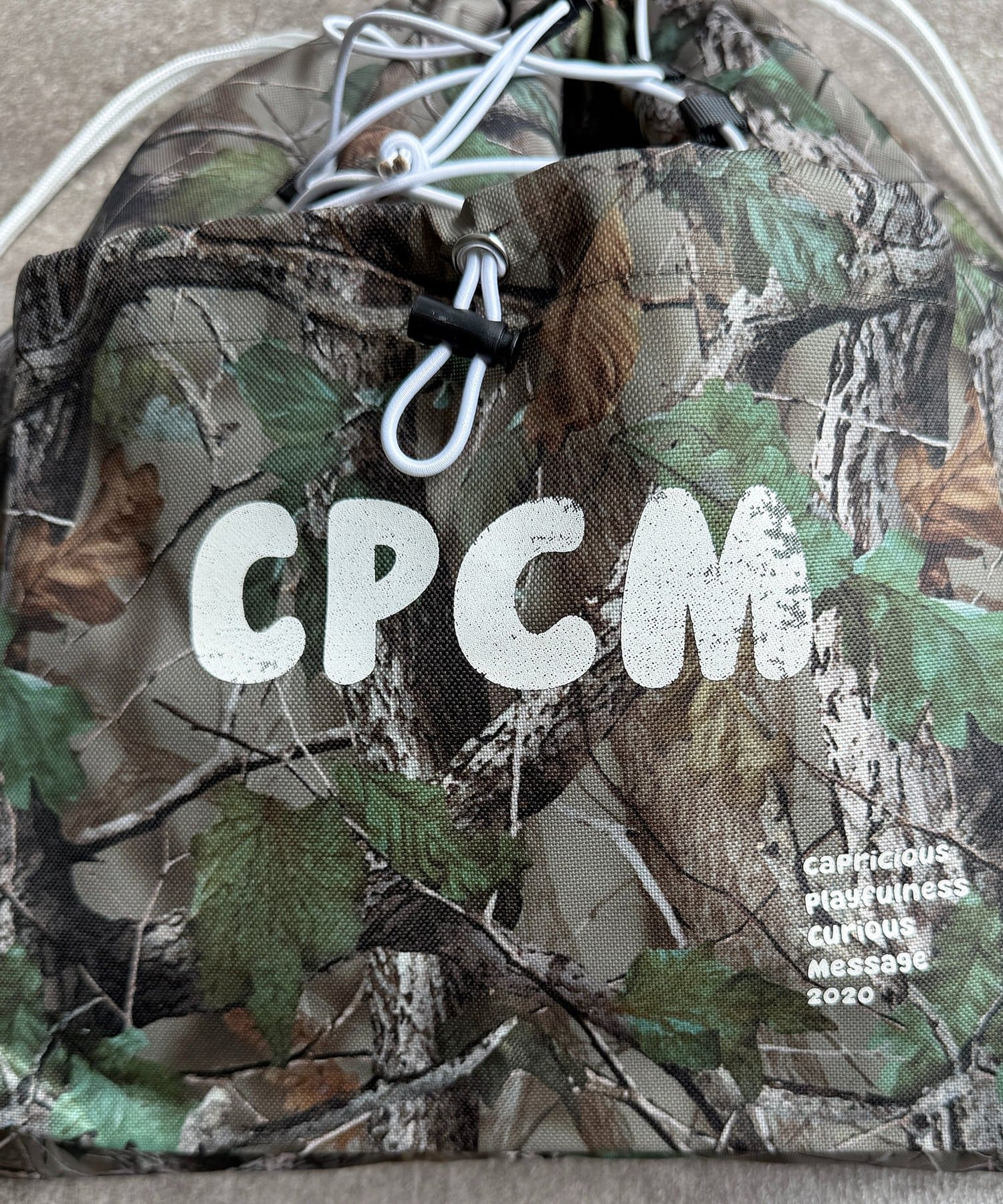 CPCM(シーピーシーエム) カラーロゴナップサック