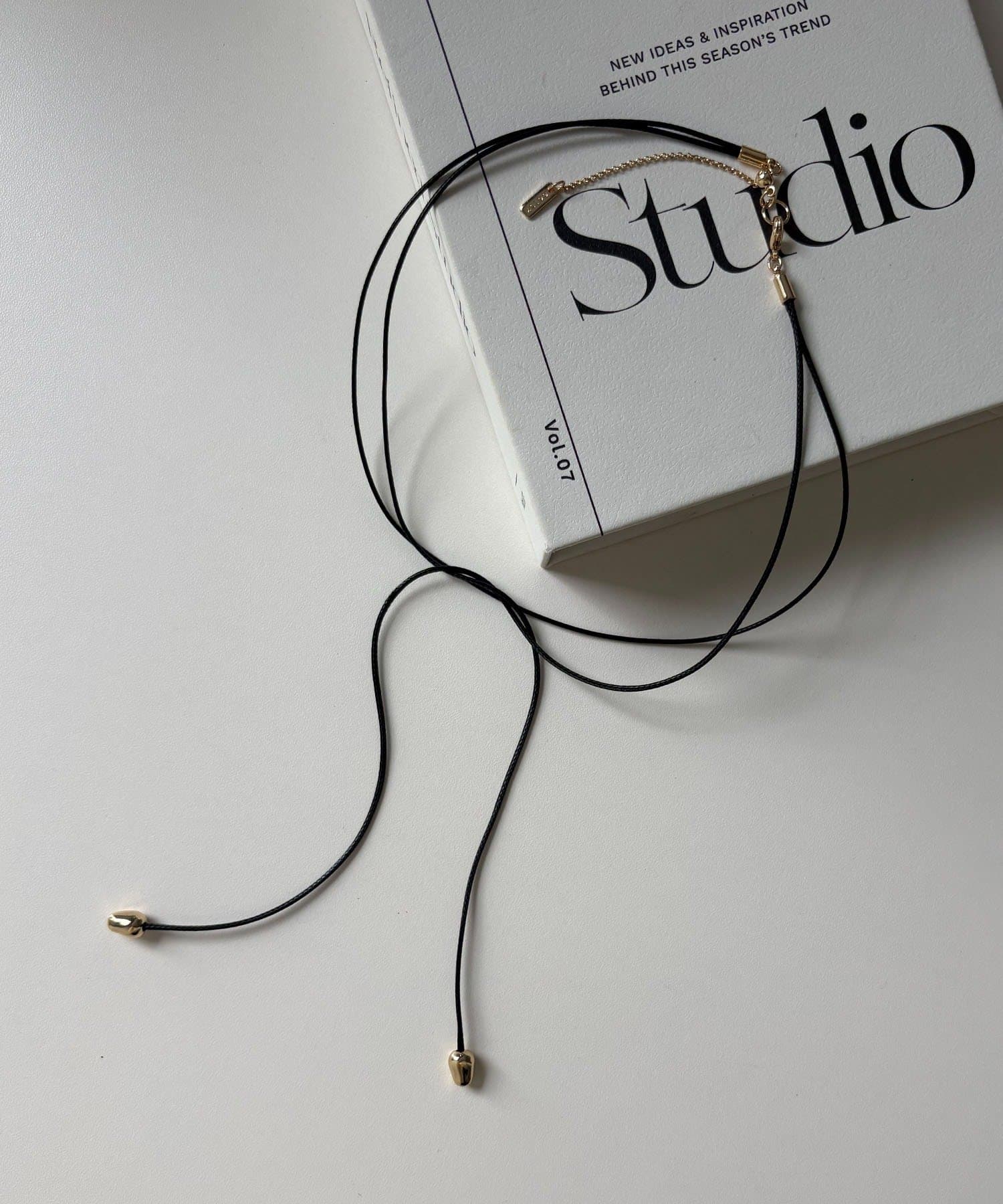 CAPRICIEUX LE'MAGE(カプリシュレマージュ) 〈GOLDY/ゴールディ〉ドロップコードチョーカー