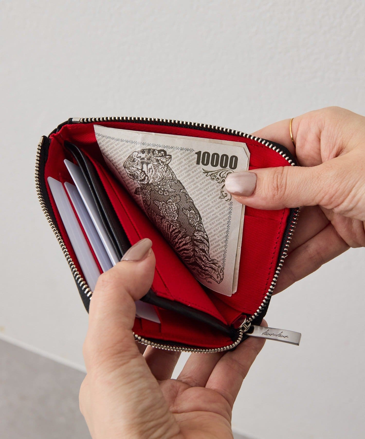 ear PAPILLONNER(イア パピヨネ) 【kawa-kawa(カワカワ)】NO1566 ishikoroL字ミニ財布