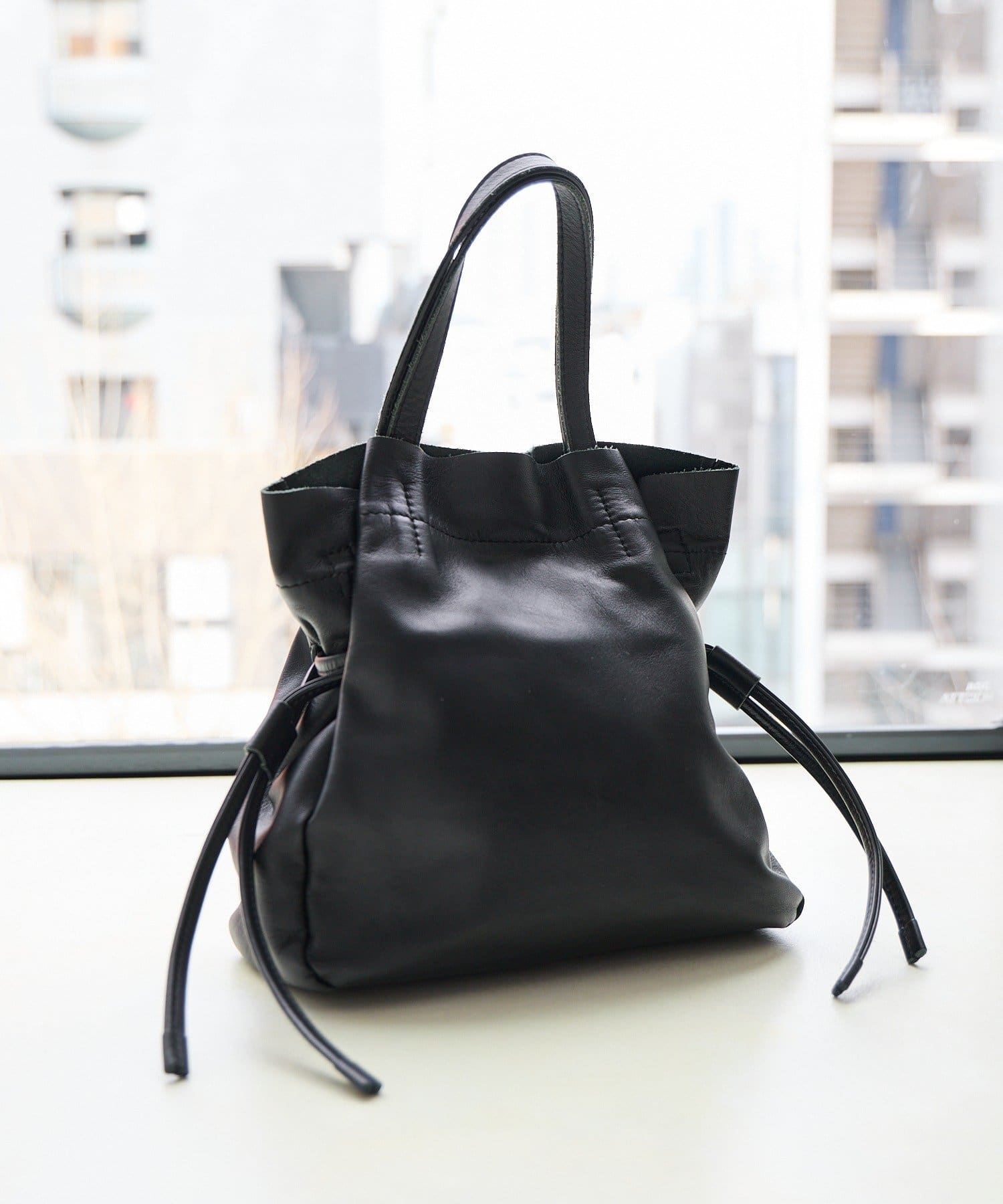 SHENERY(シーナリー) レザー巾着ショルダーバッグ