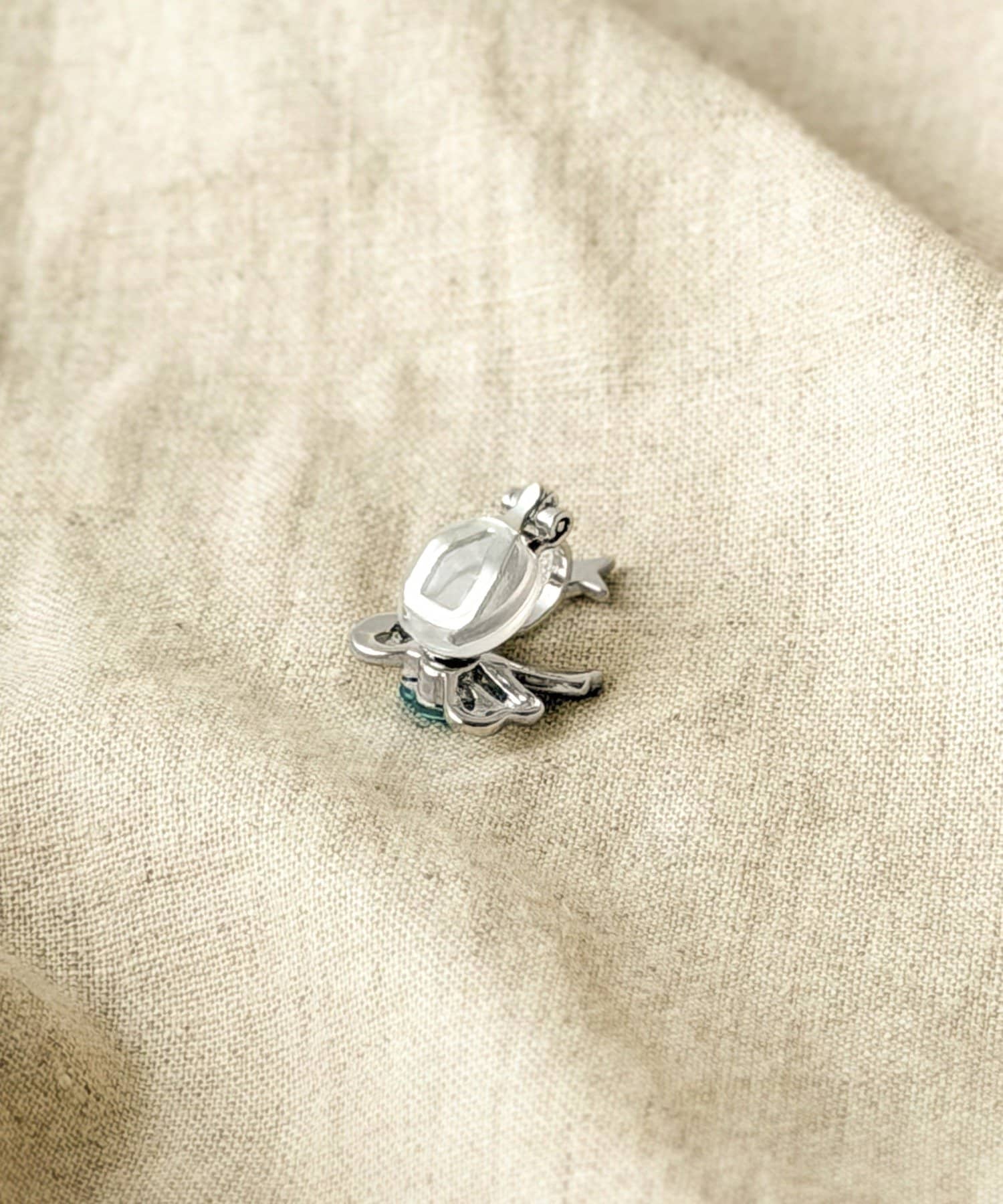 3COINS(スリーコインズ) ストーンリボンイヤリング／KIDS