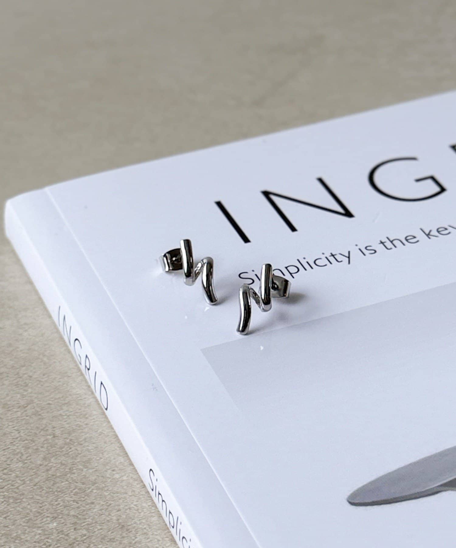 3COINS(スリーコインズ) メタルスパイラルピアス