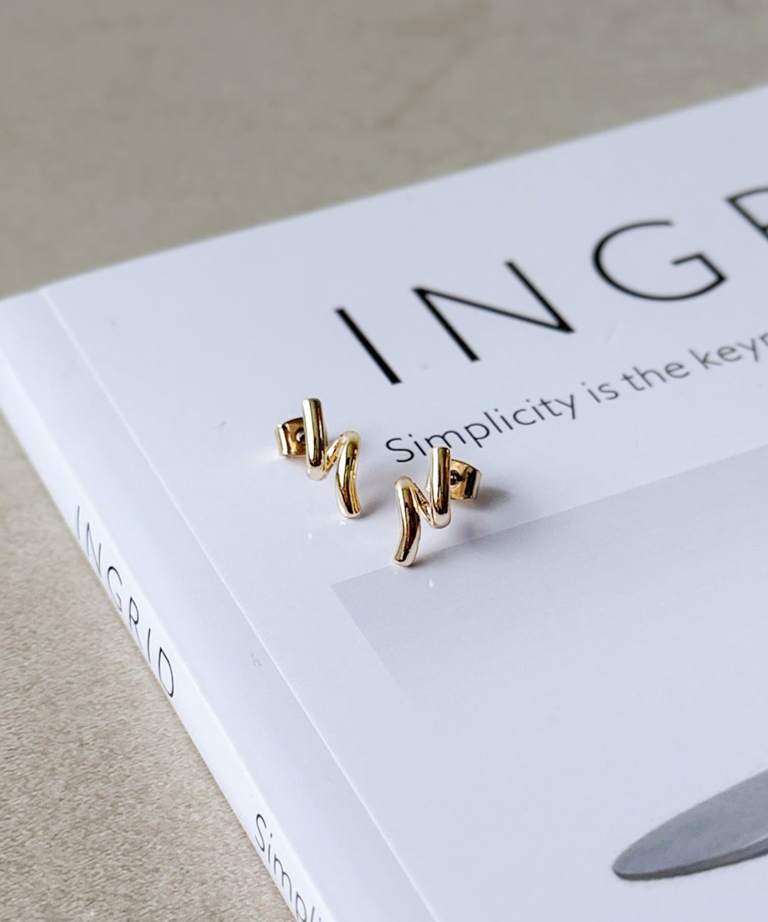 3COINS(スリーコインズ) メタルスパイラルピアス