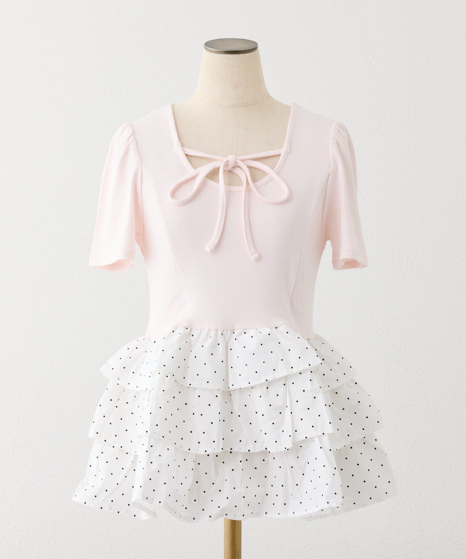 one after another NICE CLAUP(ワンアフターアナザー ナイスクラップ) リボン付き裾フリルトップス