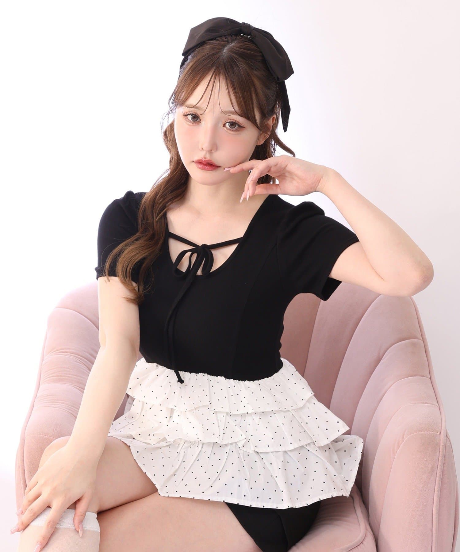 one after another NICE CLAUP(ワンアフターアナザー ナイスクラップ) リボン付き裾フリルペプラムトップス