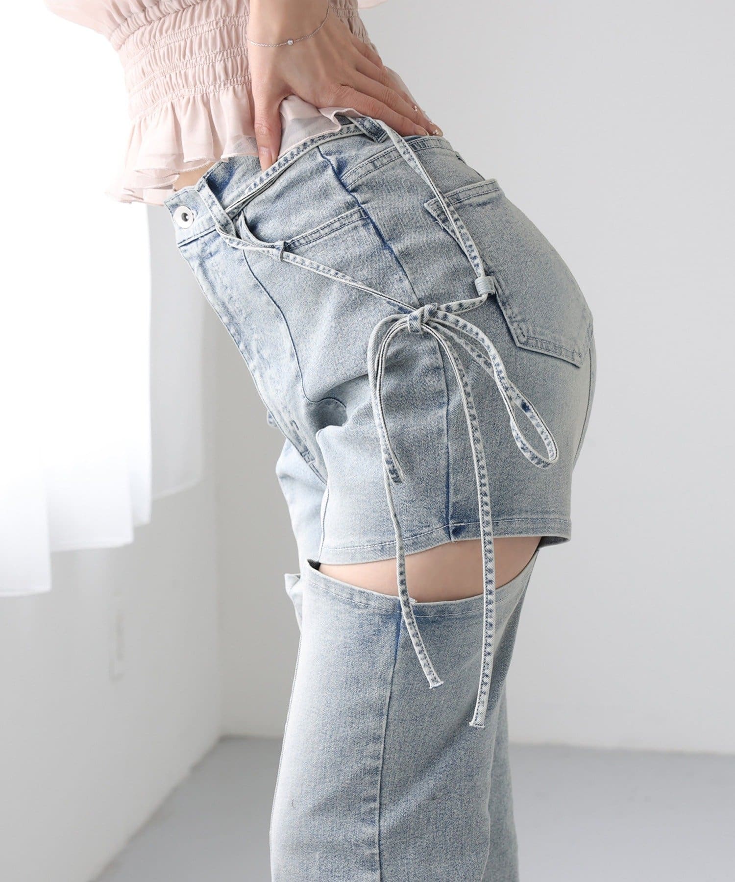 one after another NICE CLAUP(ワンアフターアナザー ナイスクラップ) 【SMサイズ展開あり】サイドスリットリボン美脚デニムパンツ