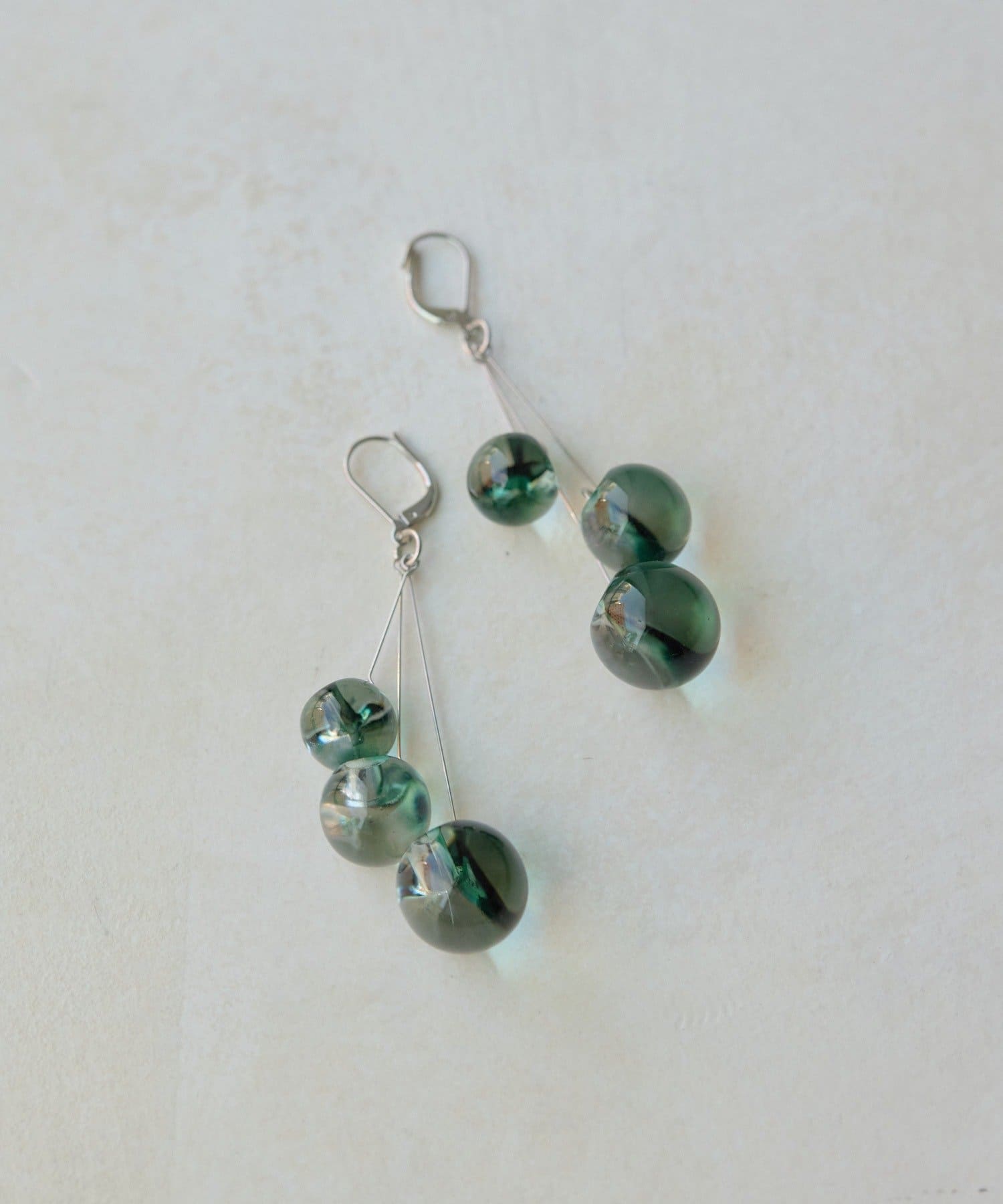 ear PAPILLONNER(イア パピヨネ) 鈴玉クリアピアス