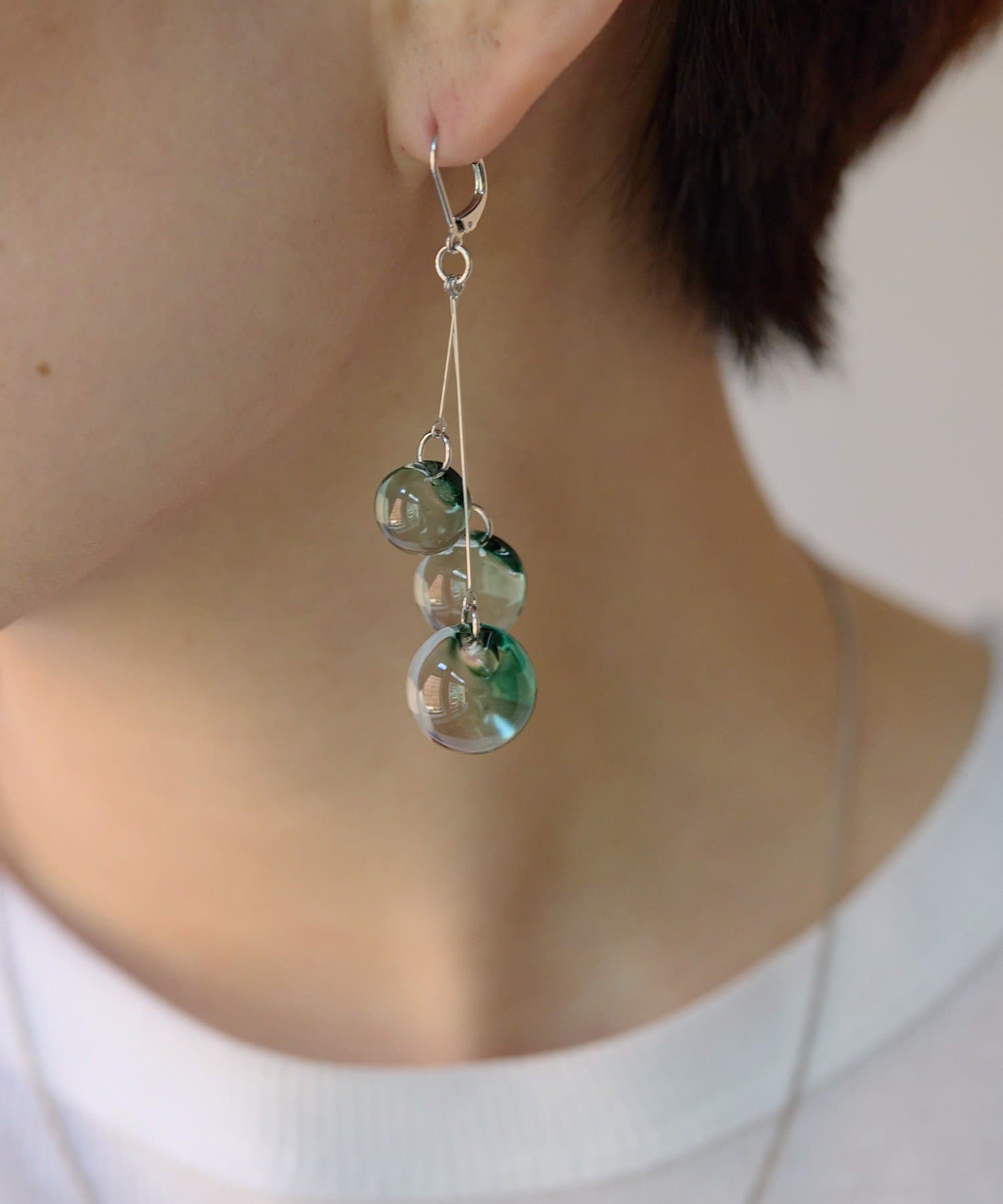 ear PAPILLONNER(イア パピヨネ) 鈴玉クリアピアス