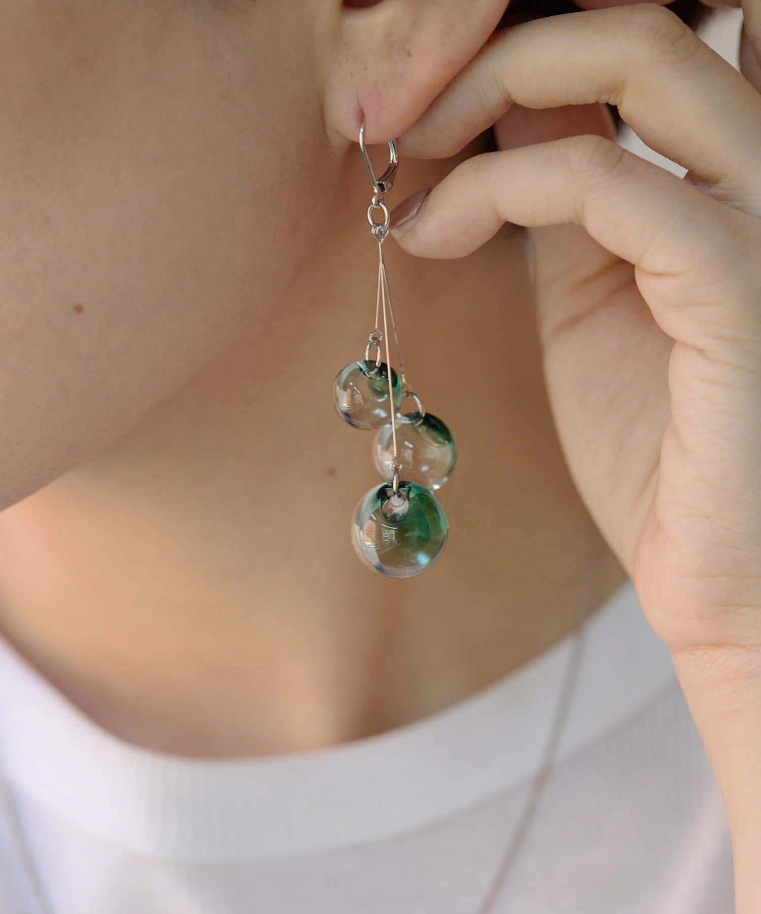 ear PAPILLONNER(イア パピヨネ) 鈴玉クリアピアス