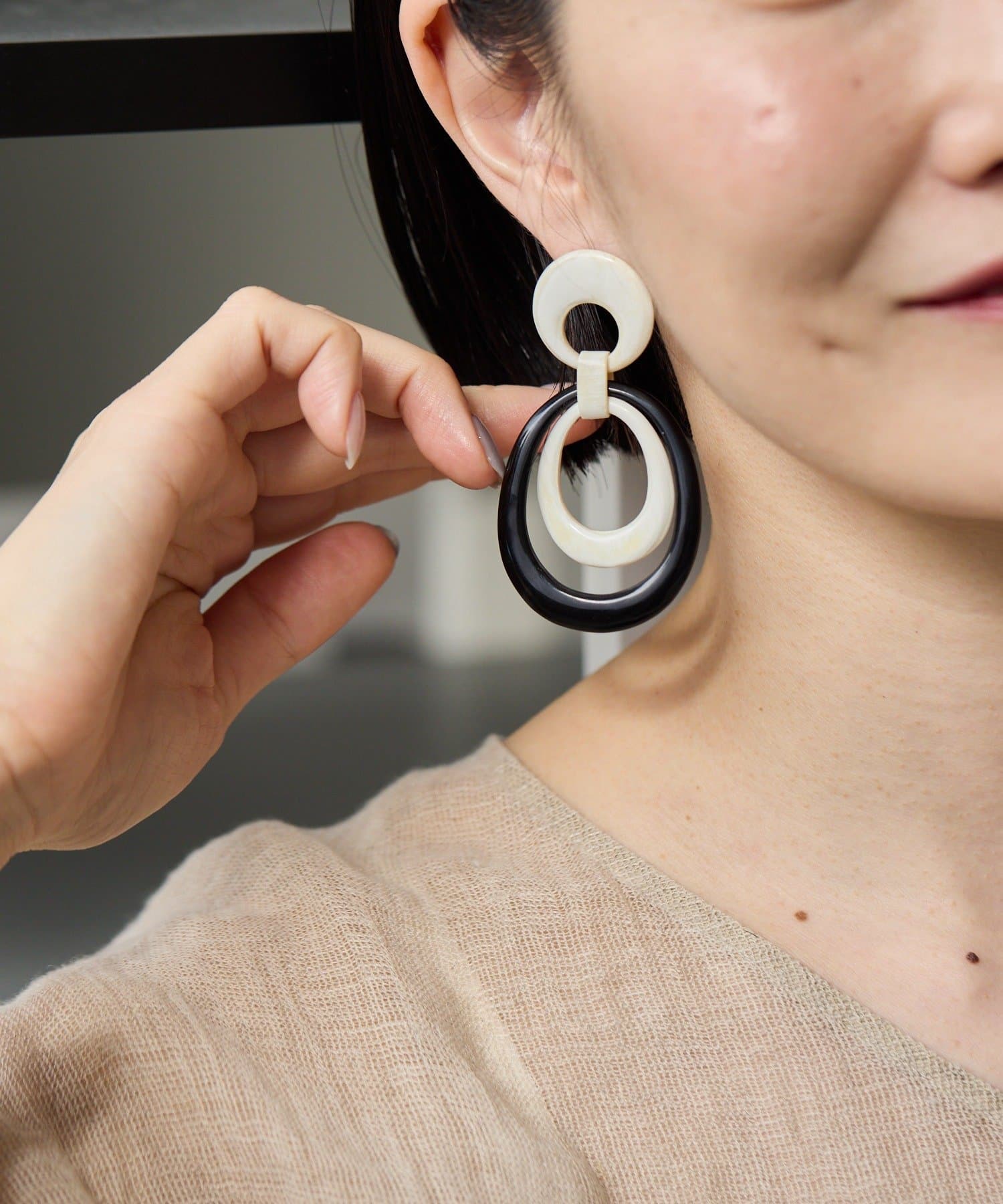 ear PAPILLONNER(イア パピヨネ) 水牛角Wリングピアス