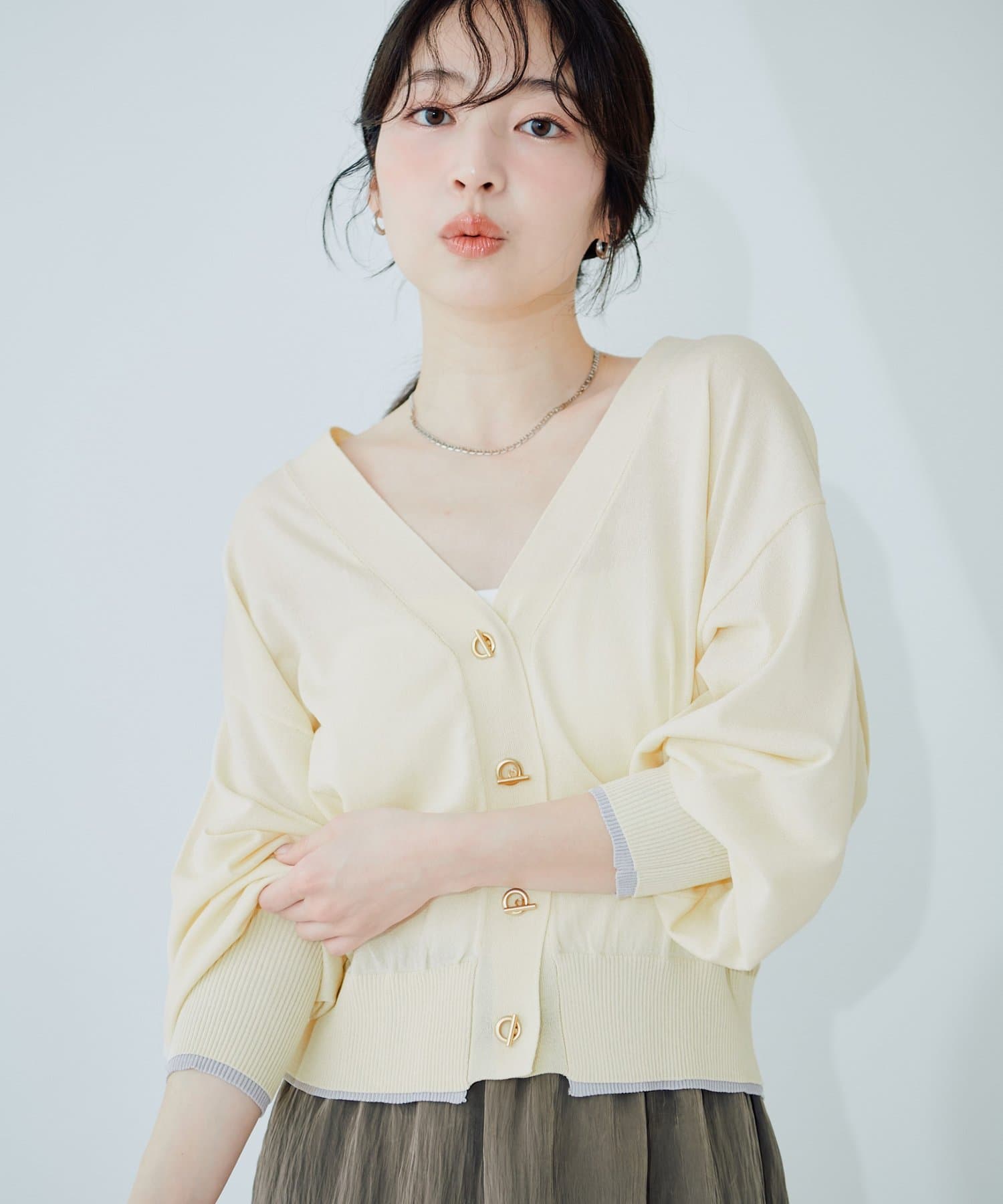 natural couture(ナチュラルクチュール) 裾配色ハトメバー釦カーディガン