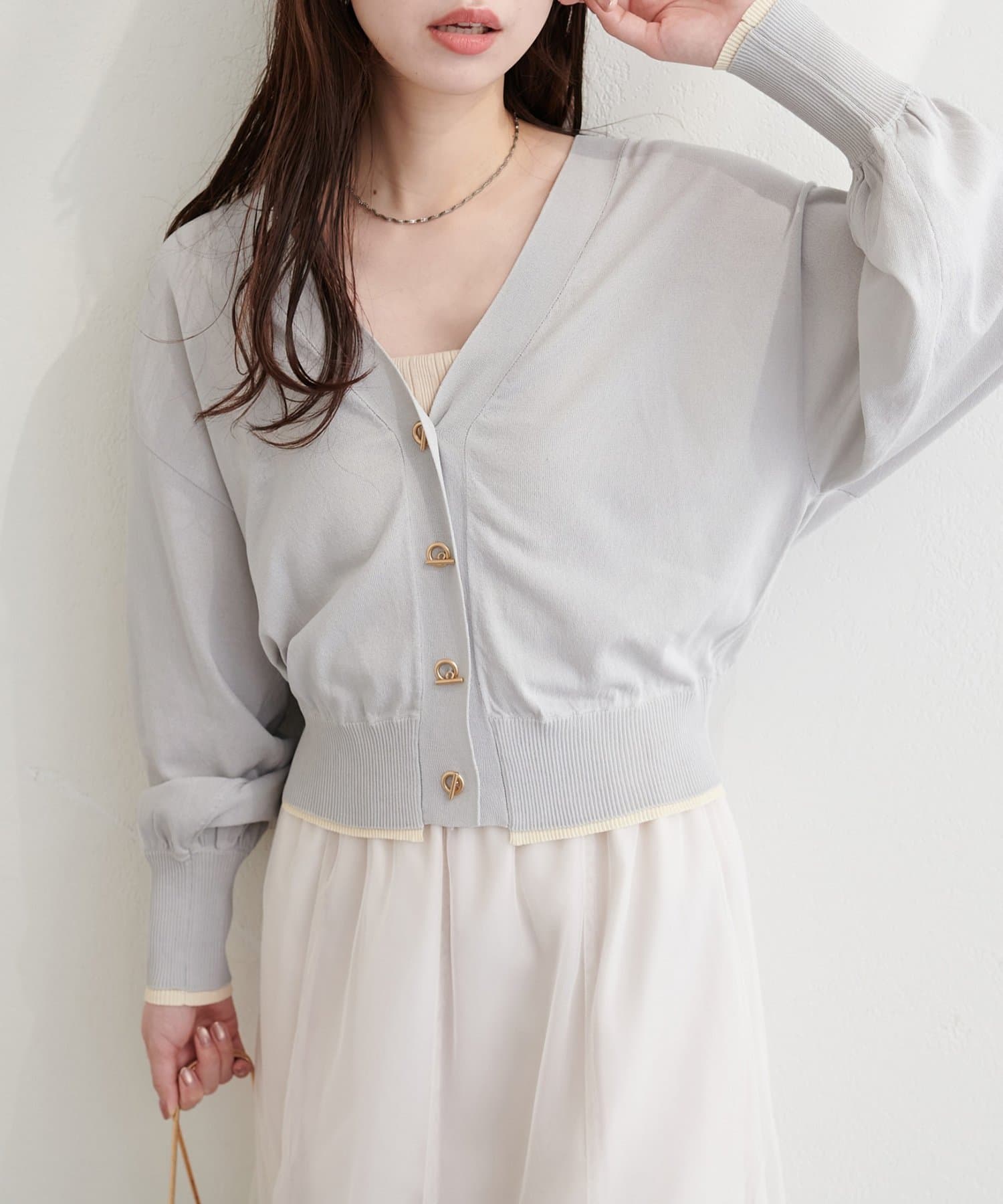 natural couture(ナチュラルクチュール) 裾配色ハトメバー釦カーディガン