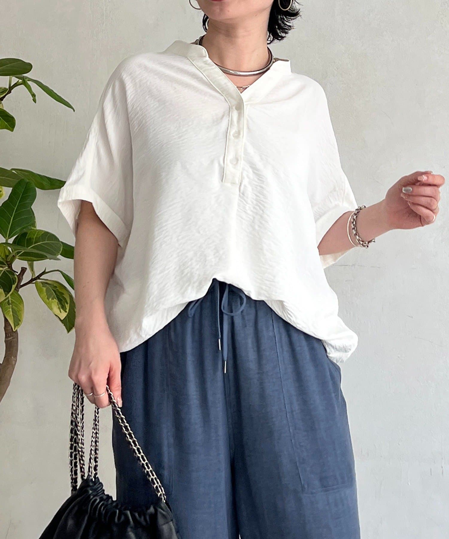 un dix cors(アンディコール) ヘンリーネック裾タックブラウス