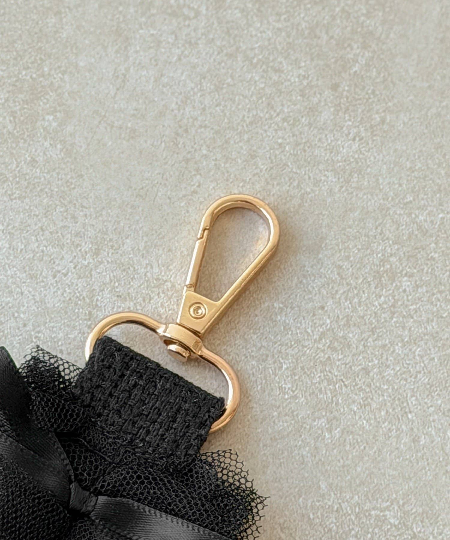 3COINS(スリーコインズ) リボンチュールハンドストラップ