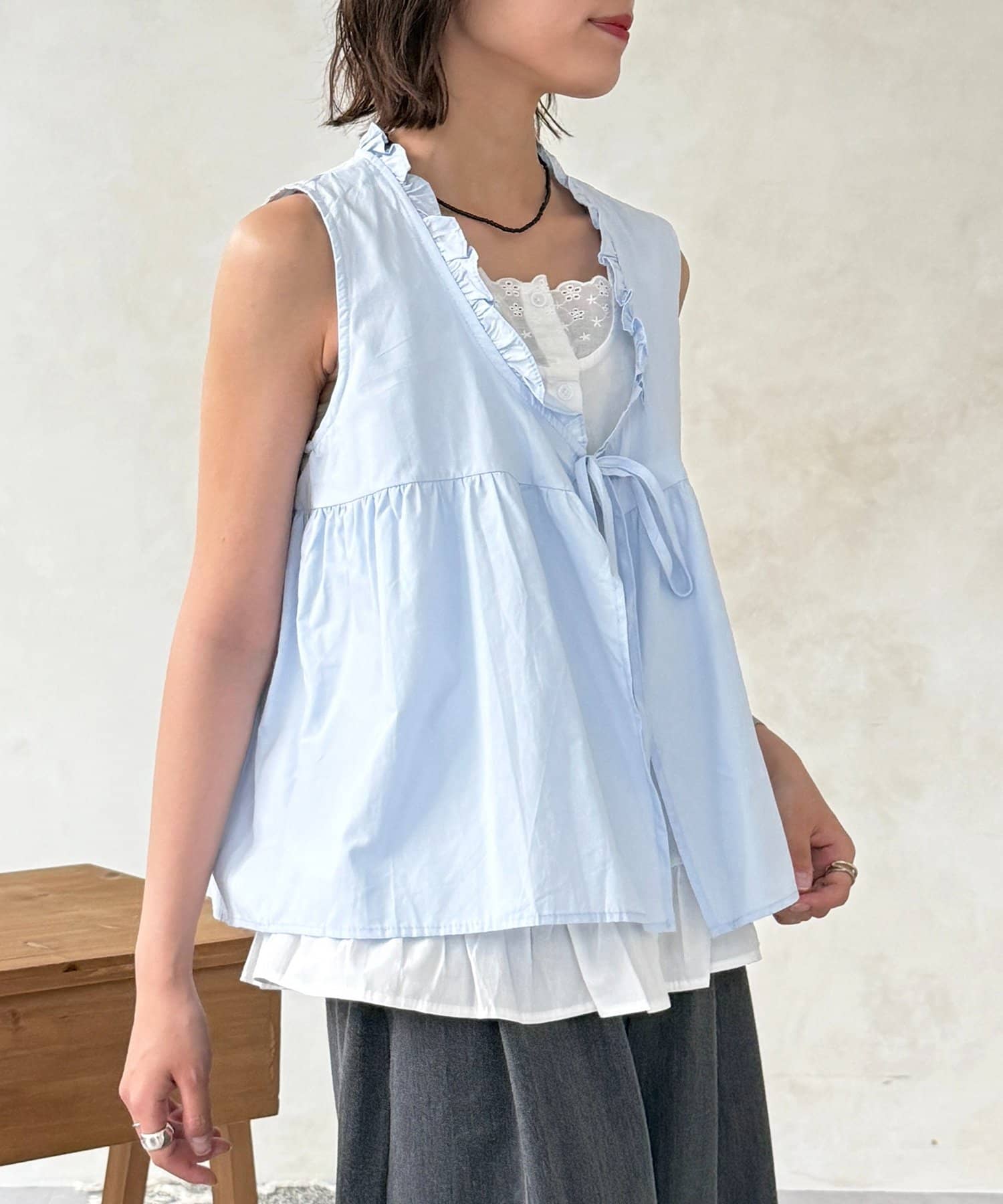 CPCM(シーピーシーエム) フェイクレイヤードフリルリボンベスト