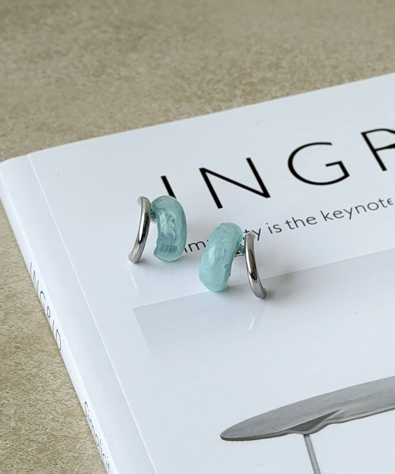 3COINS(スリーコインズ) マーブルメタルカーブピアス