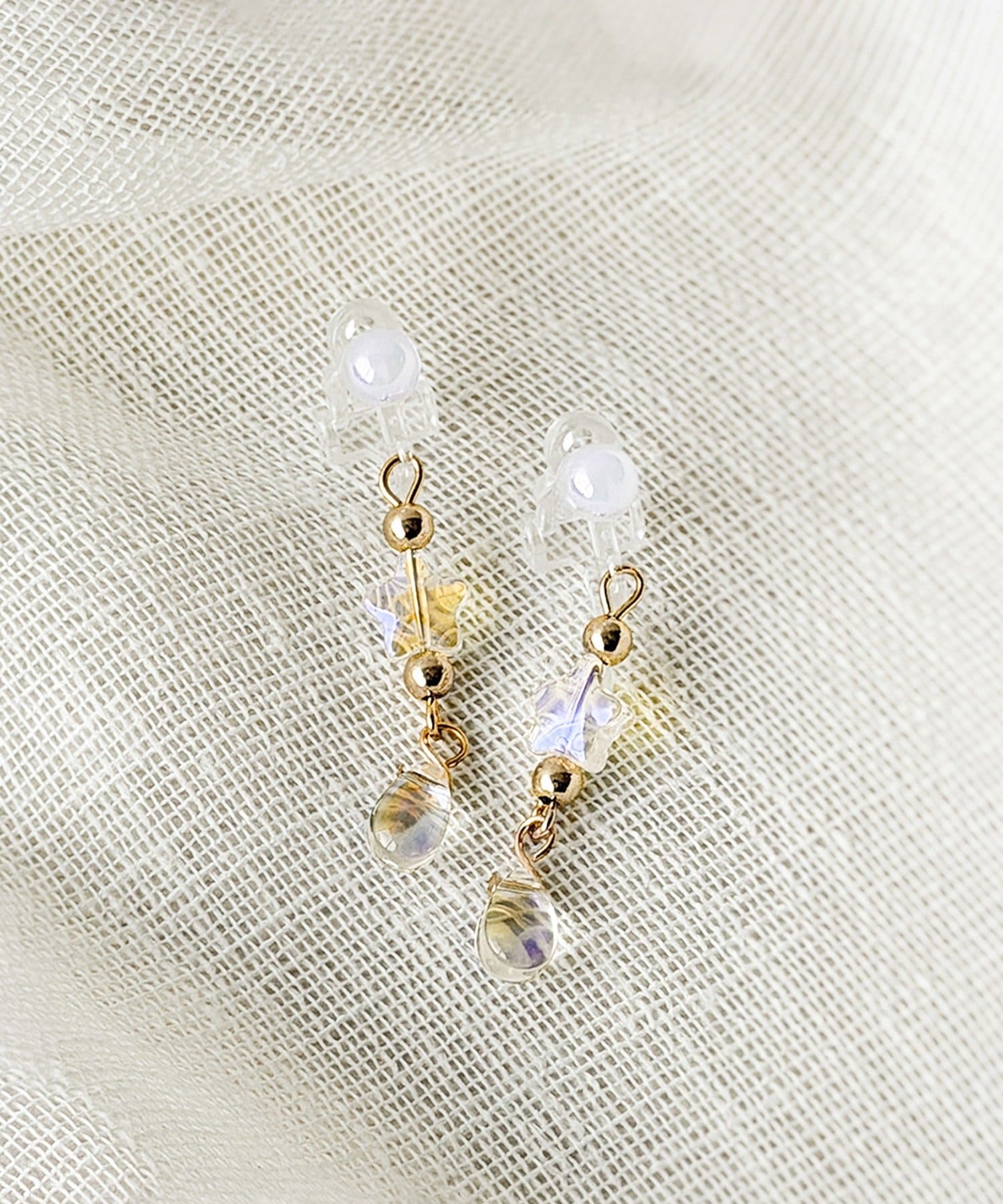 3COINS(スリーコインズ) スタードロップクリアイヤリング／KIDS