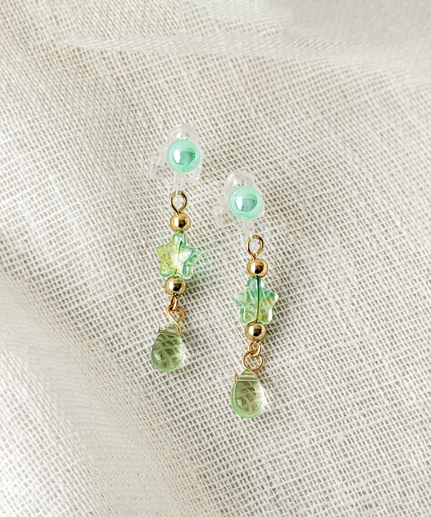 3COINS(スリーコインズ) スタードロップクリアイヤリング／KIDS