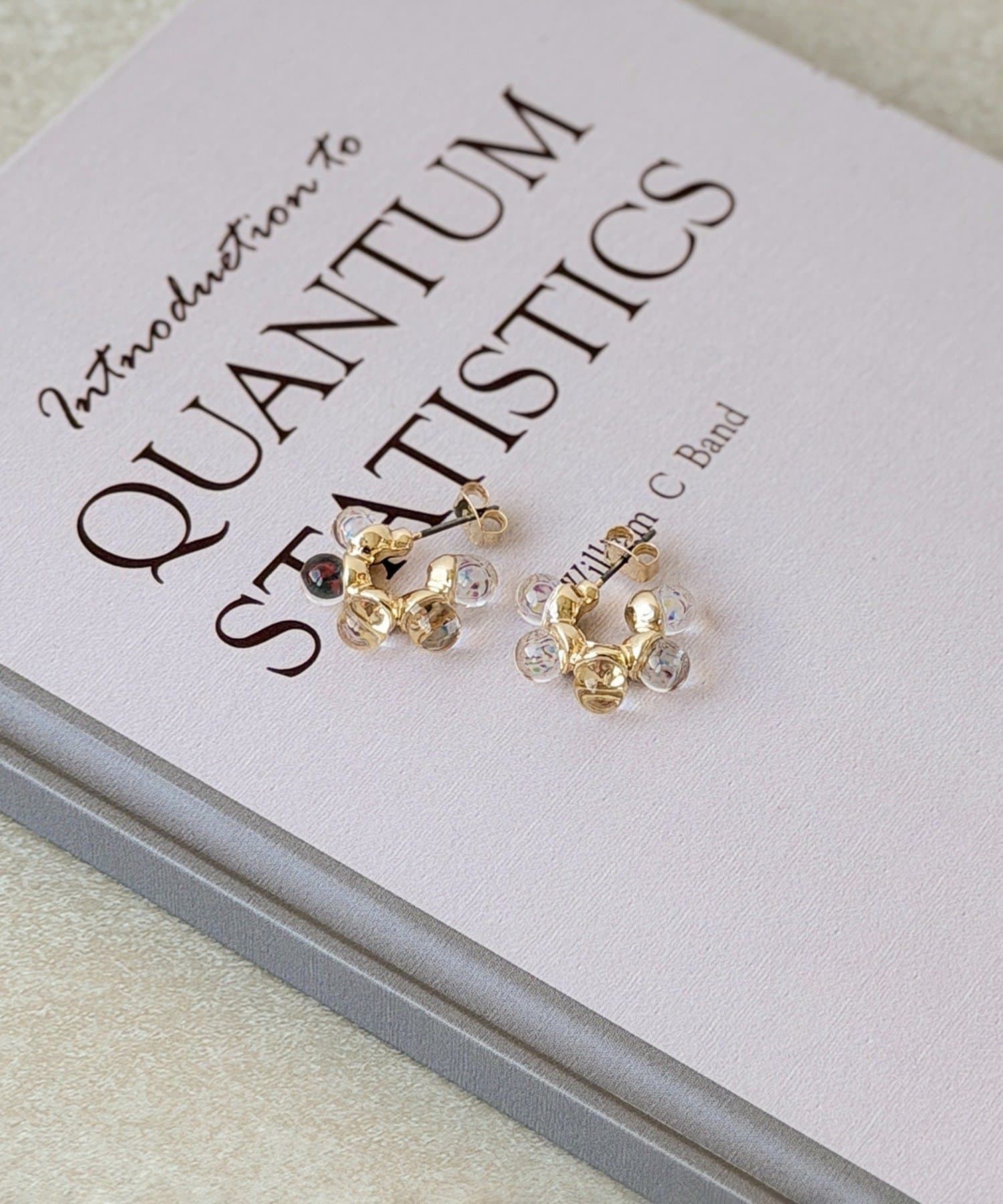 3COINS(スリーコインズ) クリアボールフープピアス