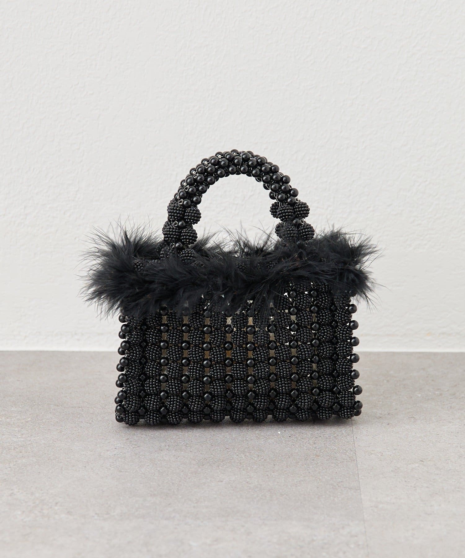 mystic(ミスティック) フェザービーズハンドBAG