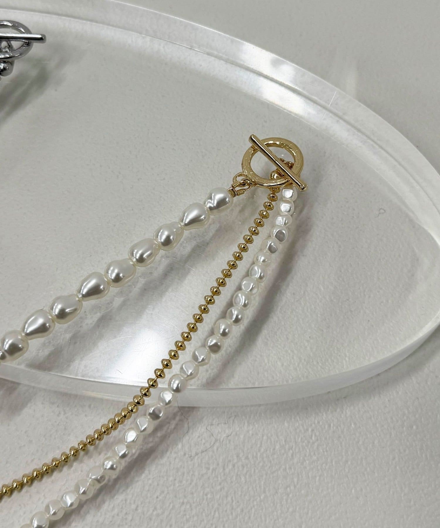 FREDY & GLOSTER(フレディ アンド グロスター) パールチェーンアシメネックレス