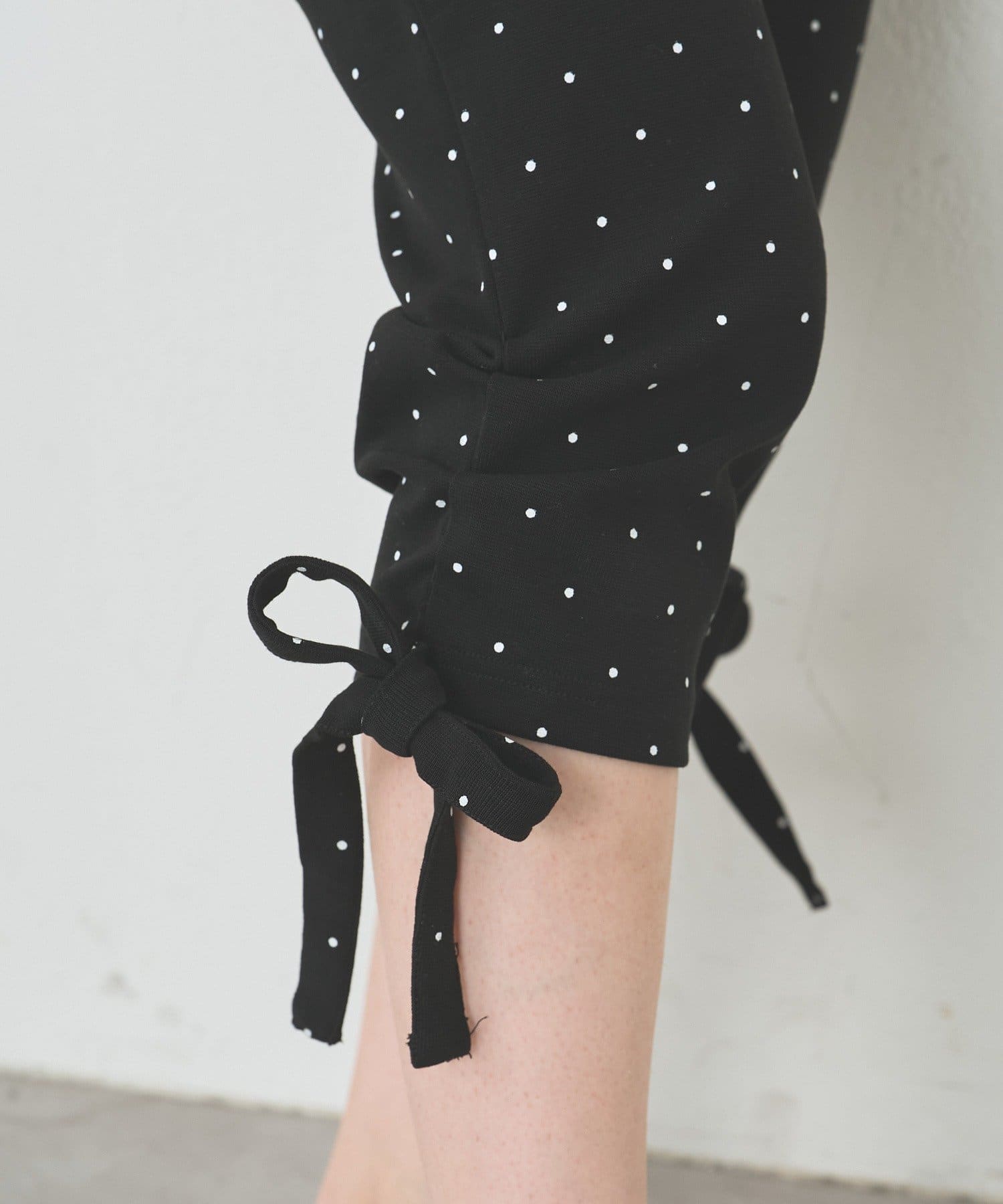 mystic(ミスティック) 裾リボンバイカーパンツ