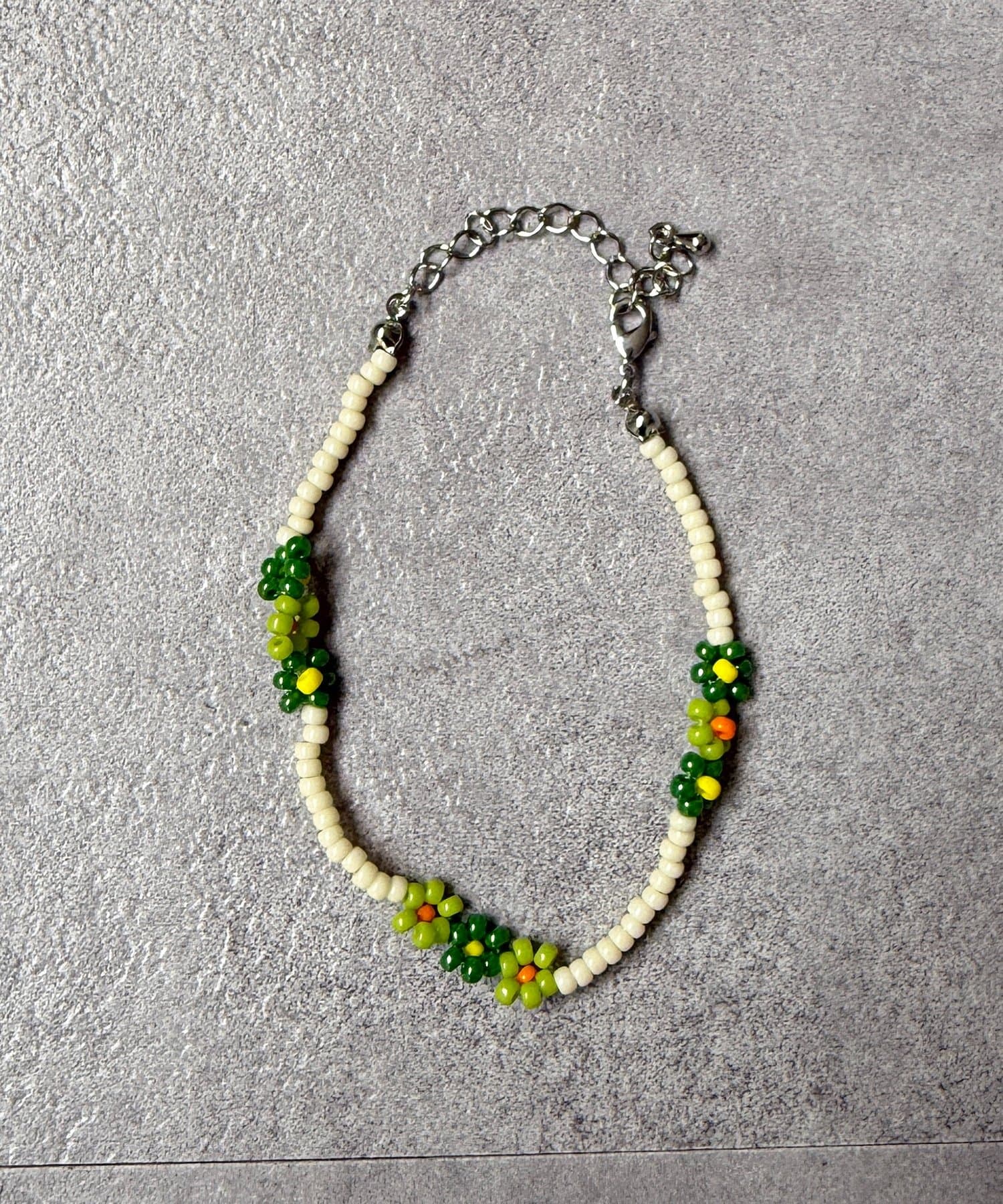 CPCM(シーピーシーエム) フラワービーズブレスレット