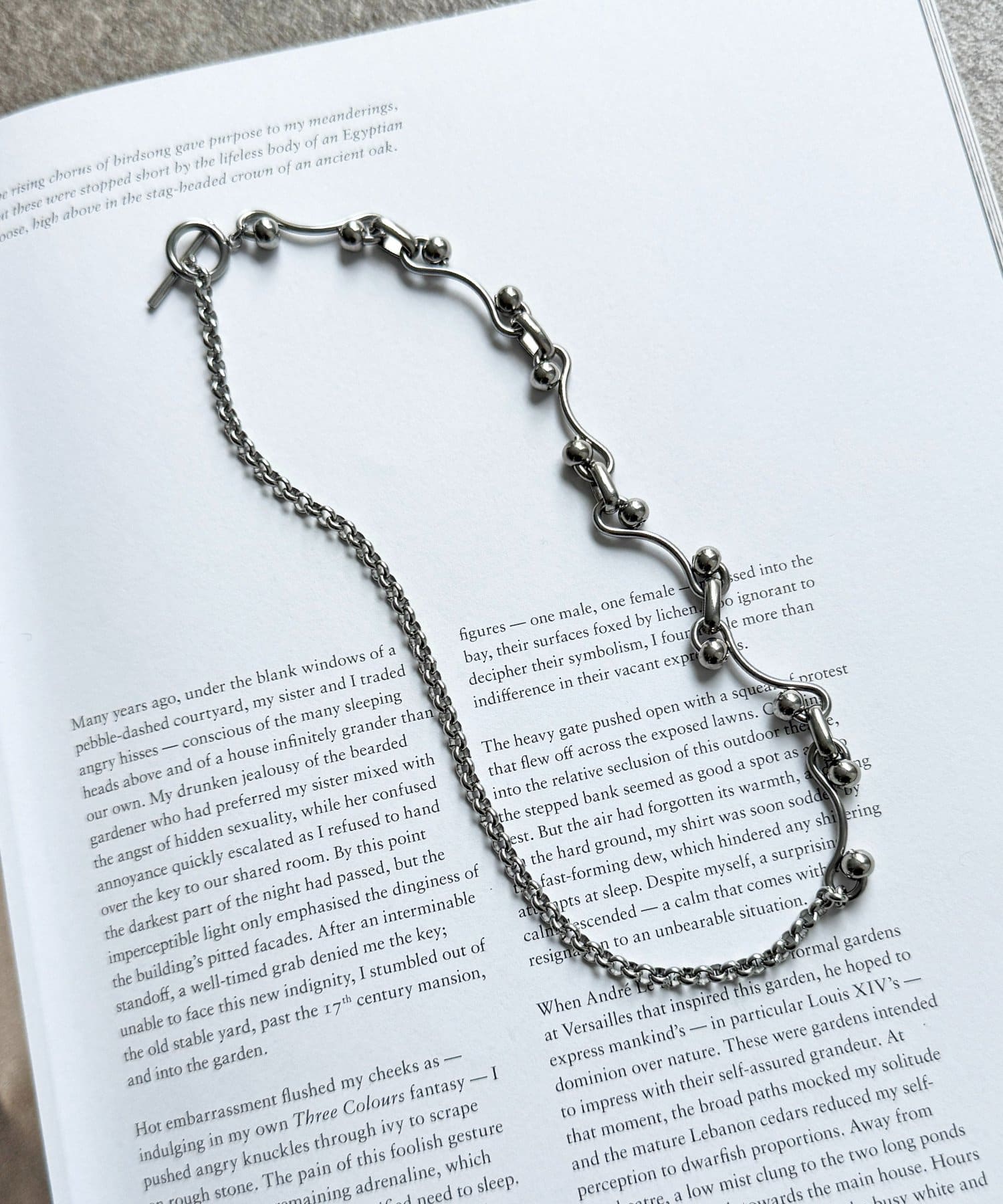 CPCM(シーピーシーエム) ステンレスウェーブネックレス