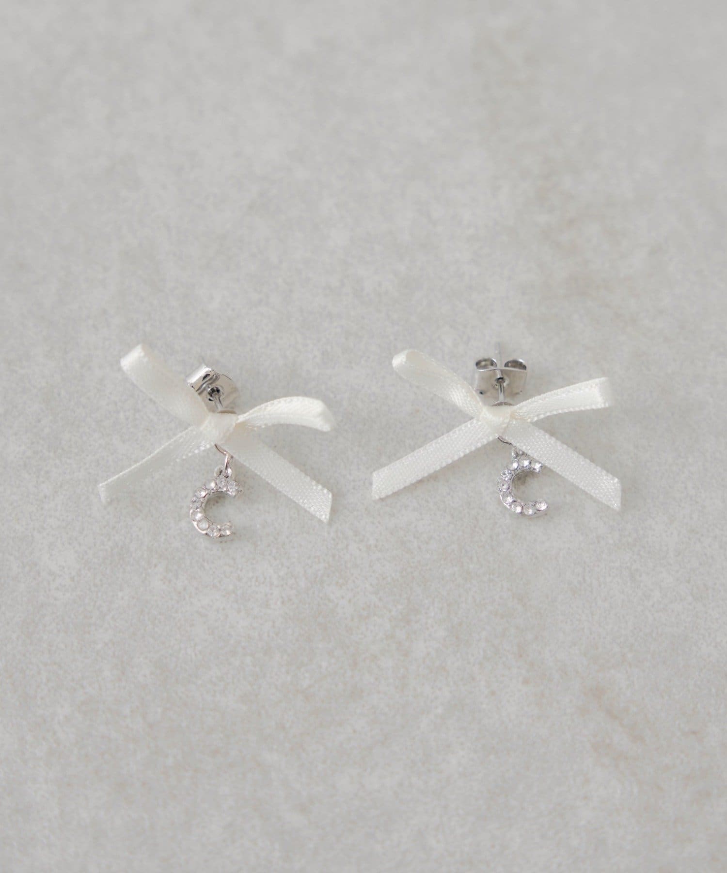 Chico(チコ) ビジューロゴリボンピアス