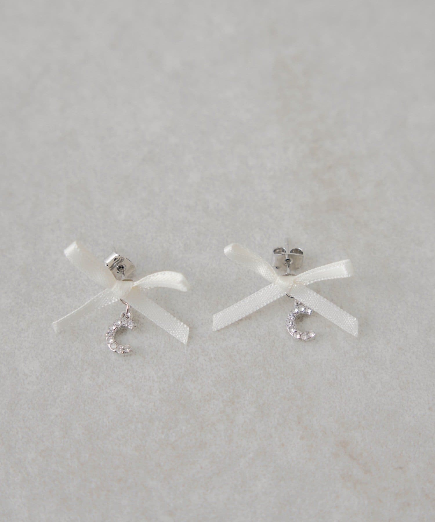 Chico(チコ) ビジューロゴリボンピアス