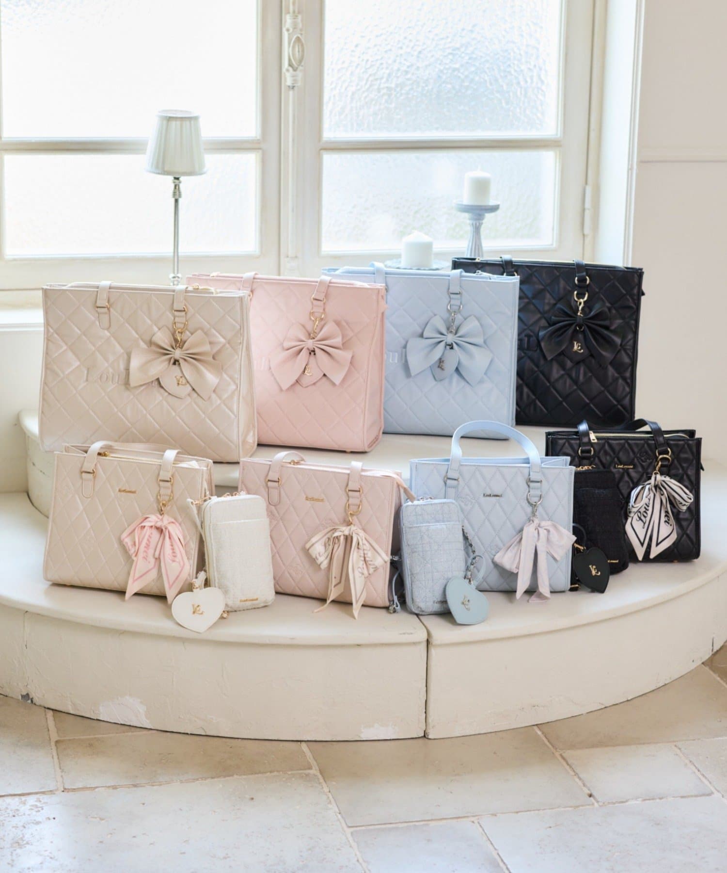 one after another NICE CLAUP(ワンアフターアナザー ナイスクラップ) 【LouLoumei】リボンチャーム付き刺繍ロゴキルティングキャリーオントート