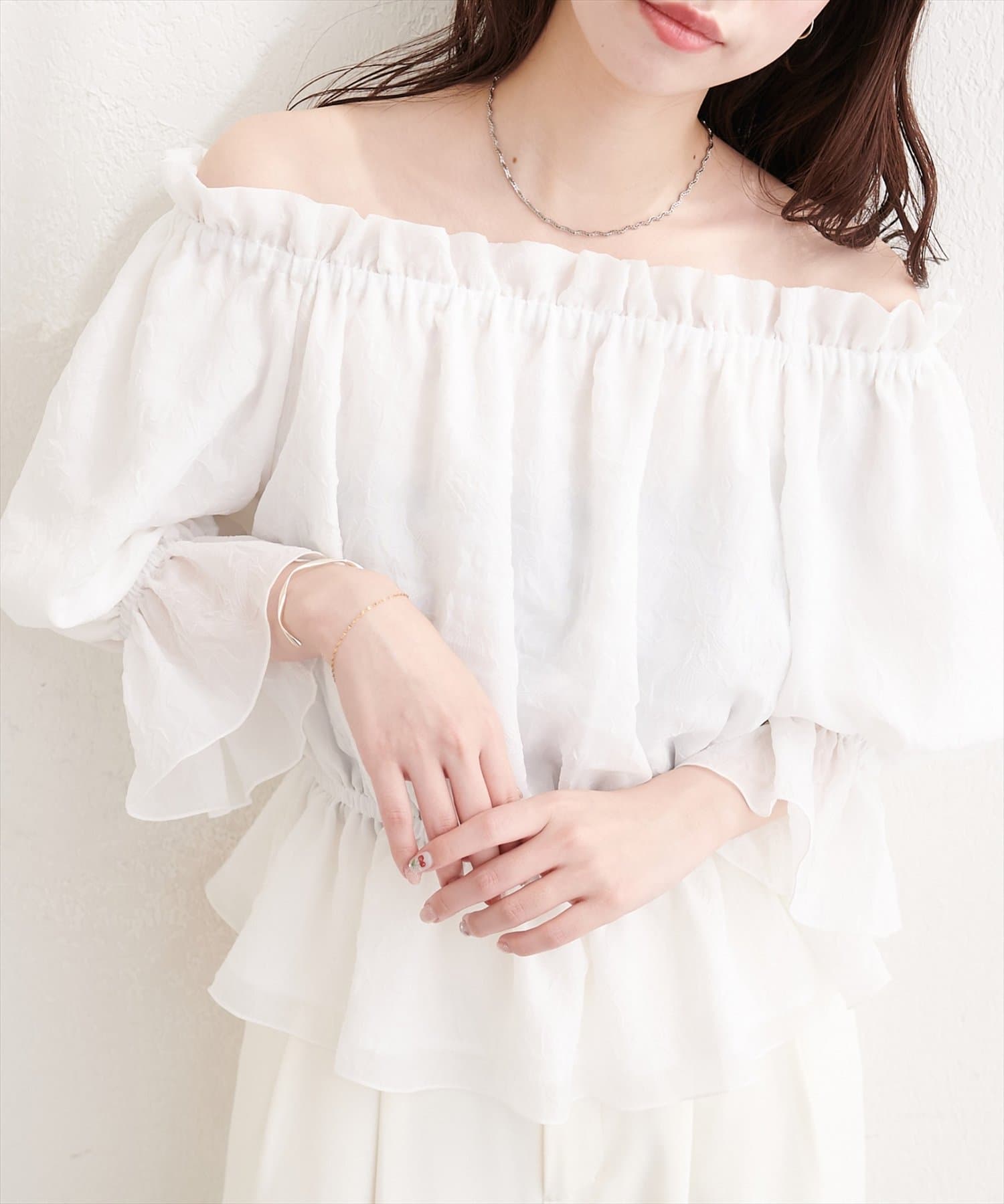 natural couture(ナチュラルクチュール) チューリップ柄オフショルペプラムブラウス