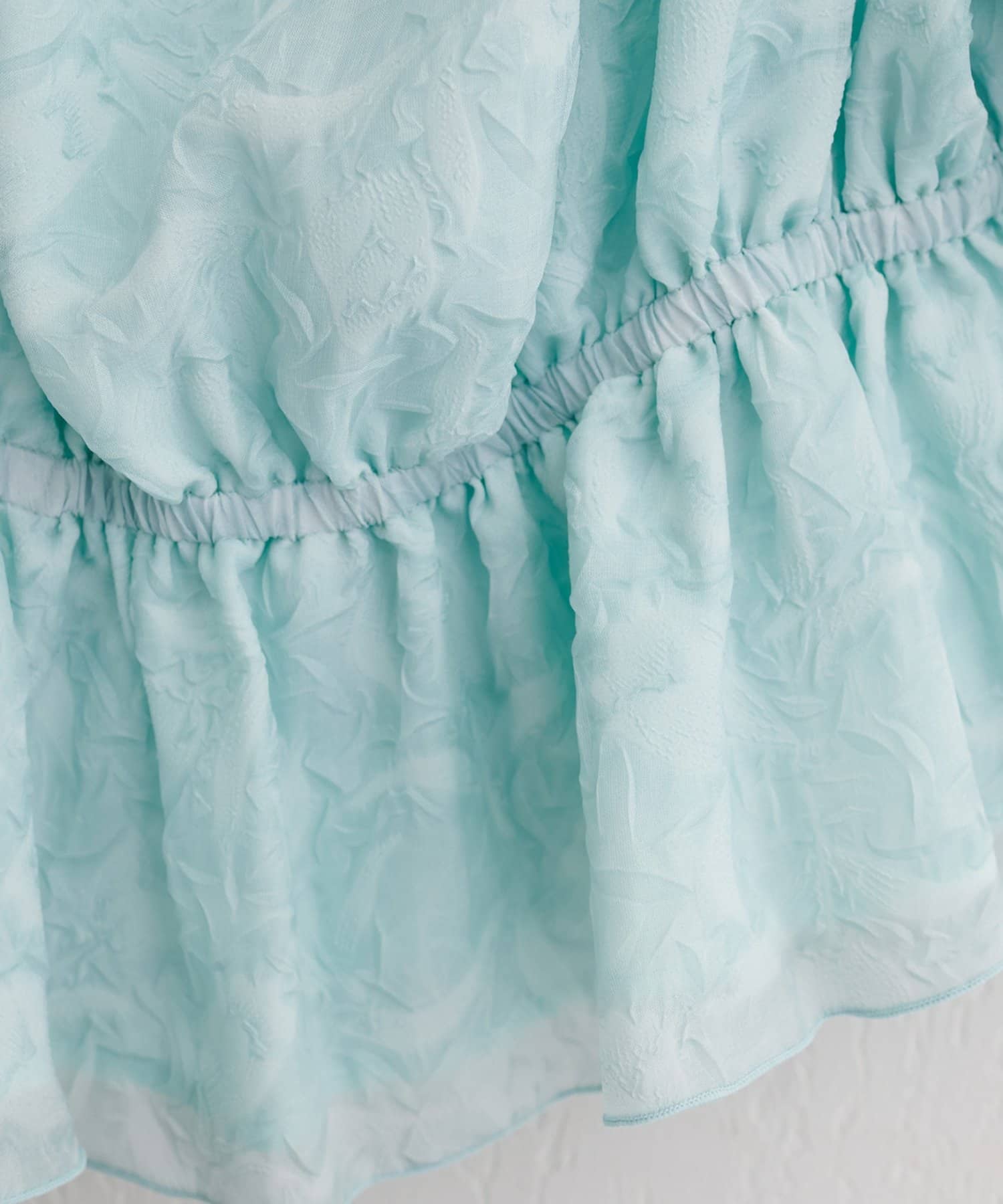 natural couture(ナチュラルクチュール) チューリップ柄オフショルペプラムブラウス