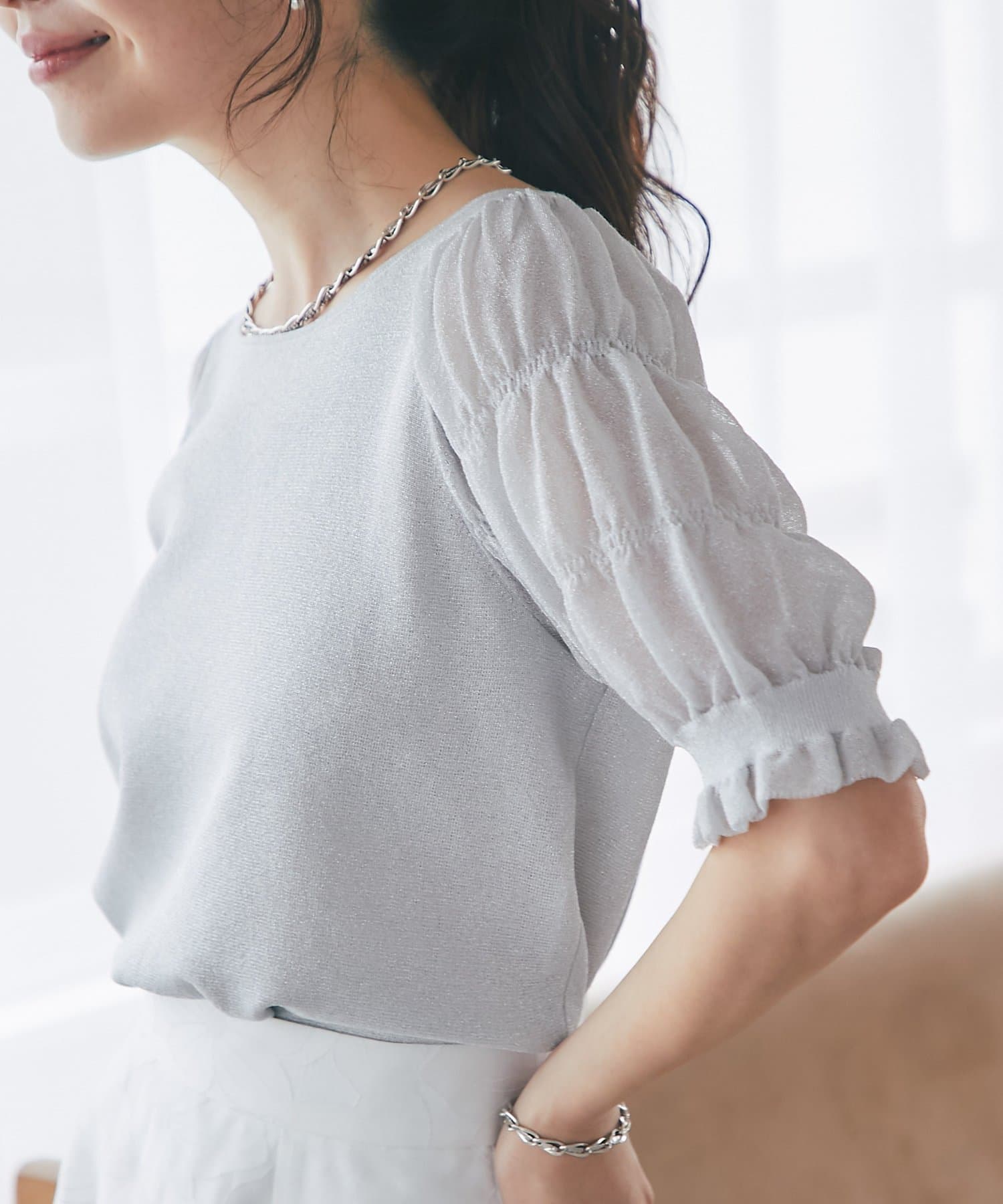 La boutique BonBon(ラブティックボンボン) シャーリング5分袖ラメニット