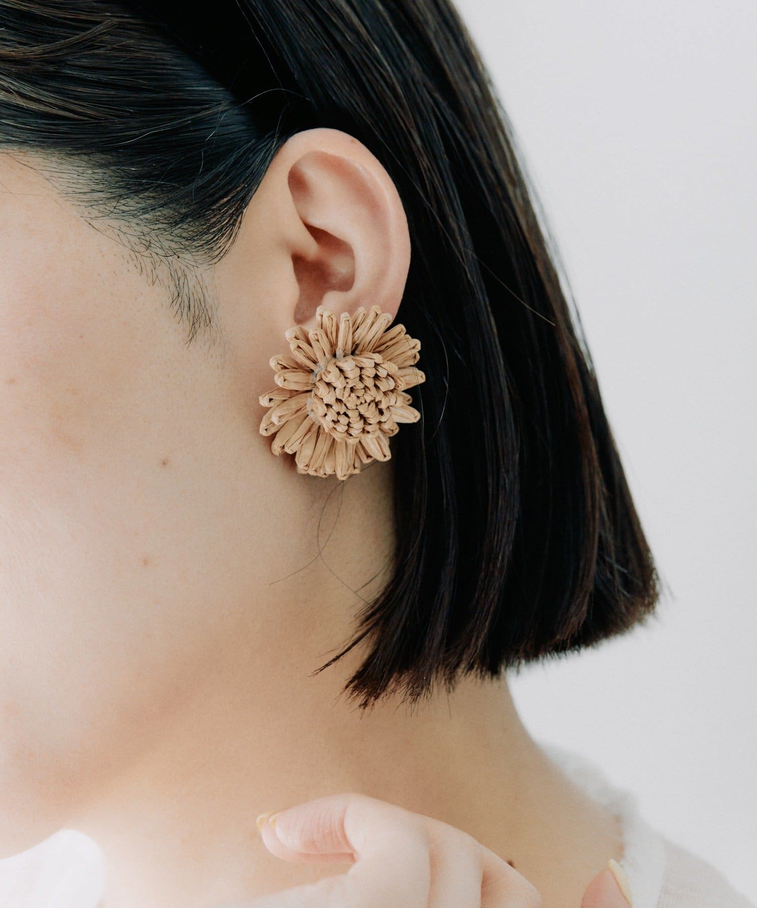 ear PAPILLONNER(イア パピヨネ) ラタンフラワーピアス