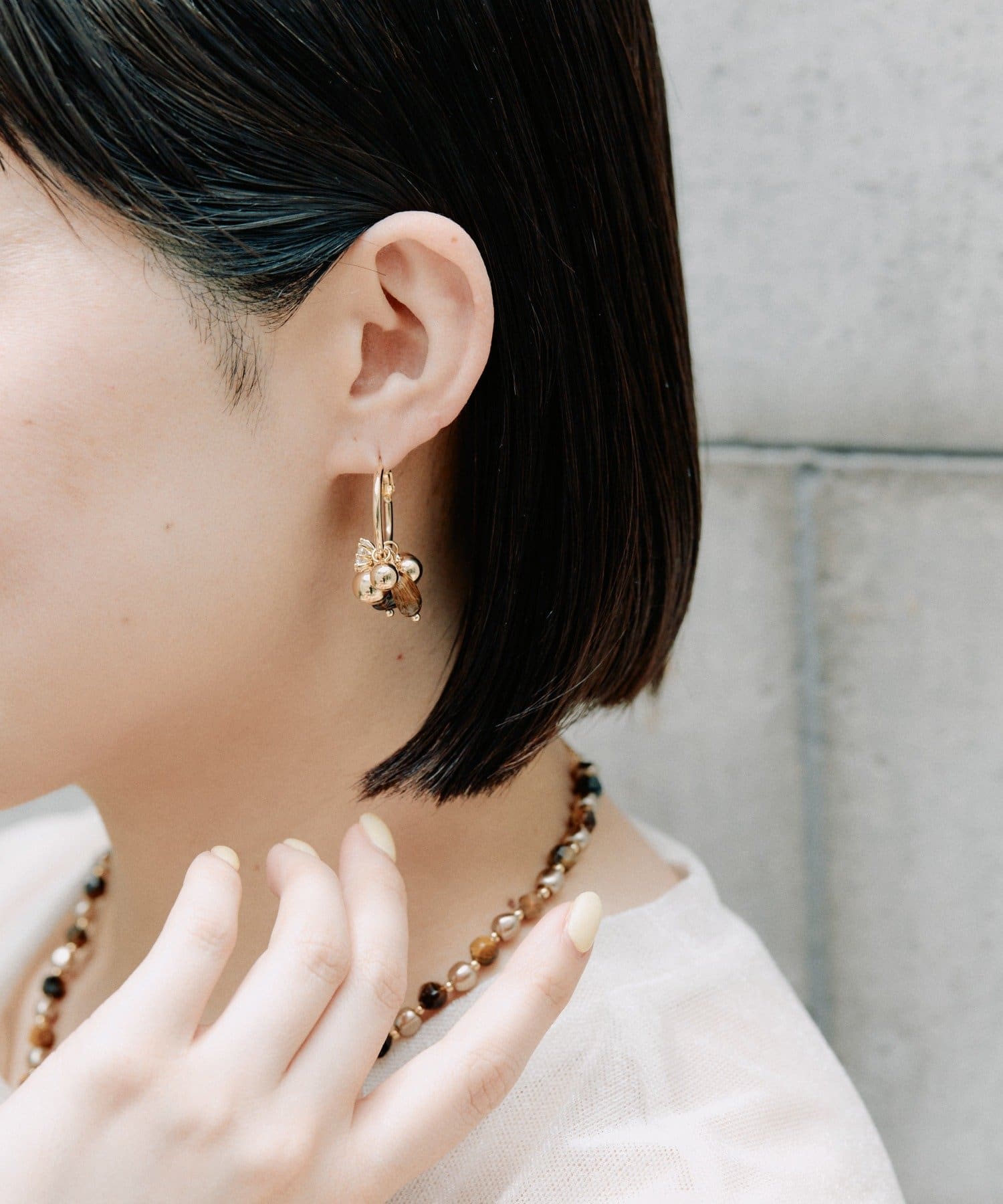 ear PAPILLONNER(イア パピヨネ) ブラウンフープピアス