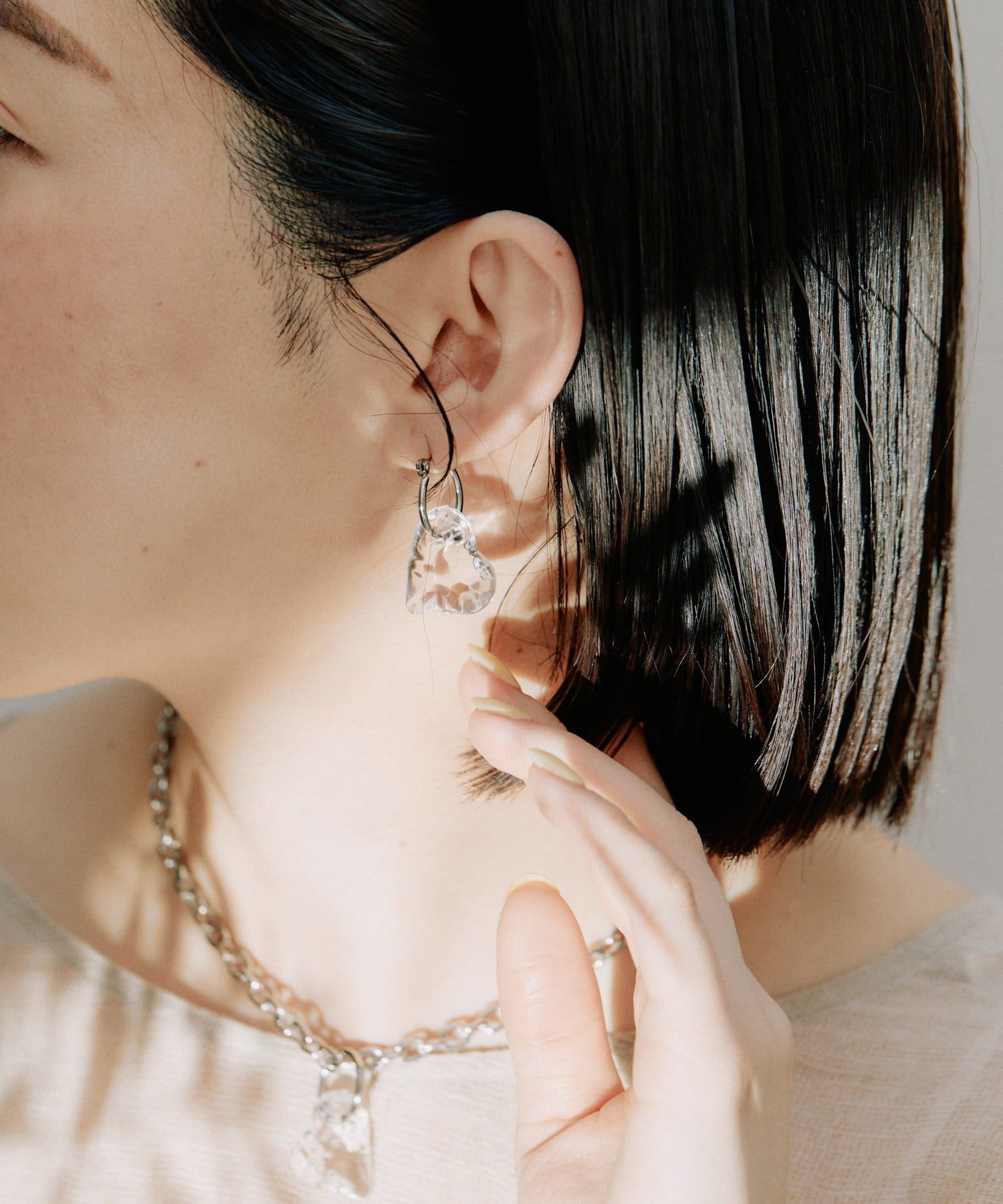 ear PAPILLONNER(イア パピヨネ) 《チタンポスト》クリアハートピアス