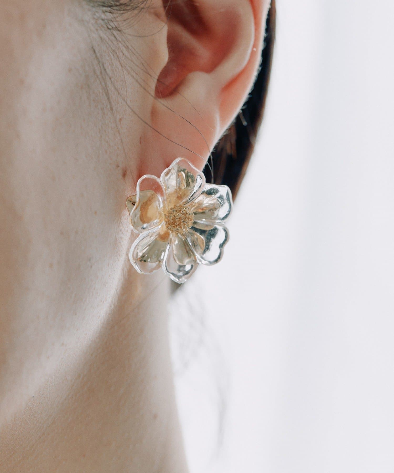 ear PAPILLONNER(イア パピヨネ) クリアペタルピアス