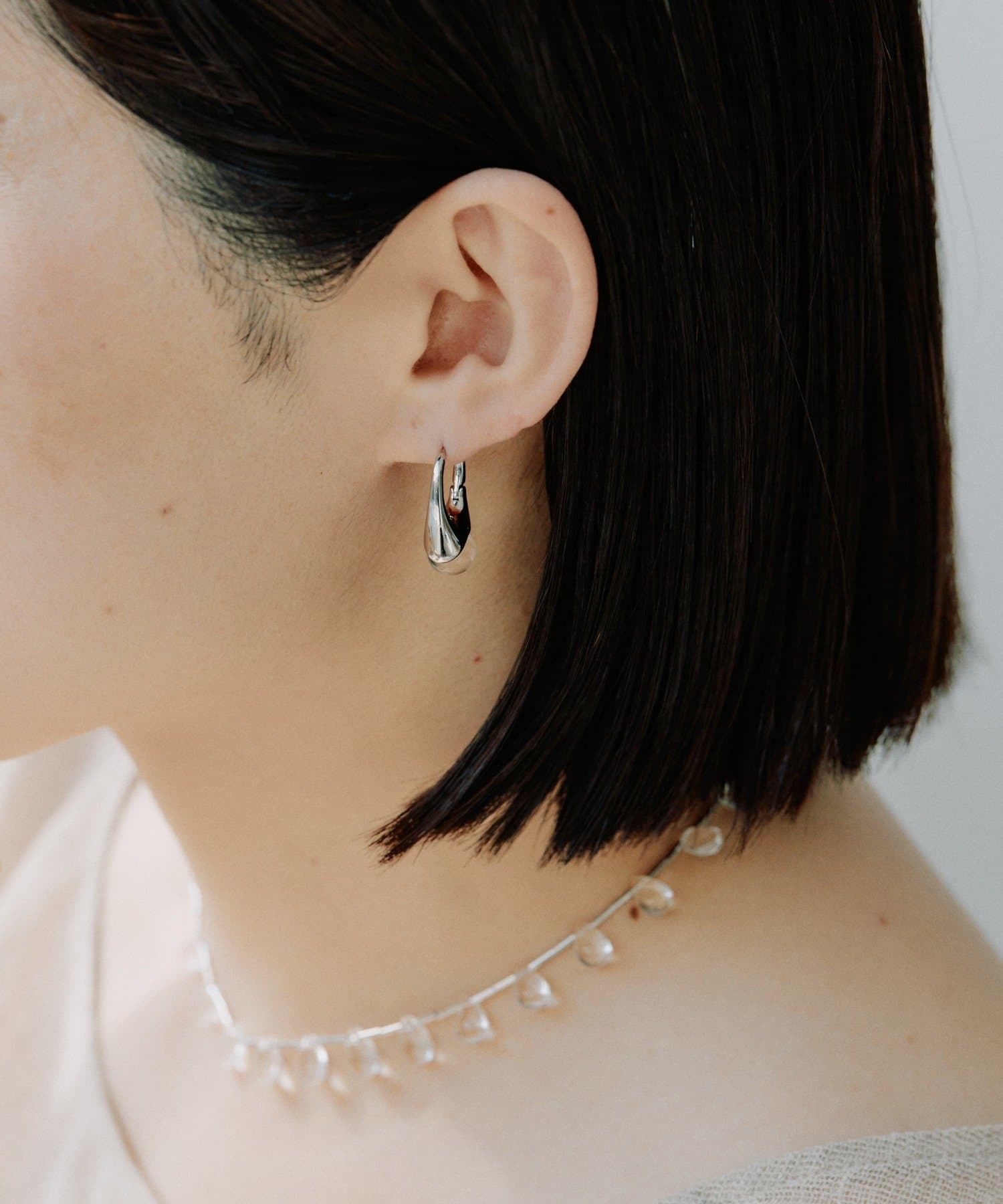 ear PAPILLONNER(イア パピヨネ) クリスタルボールピアス