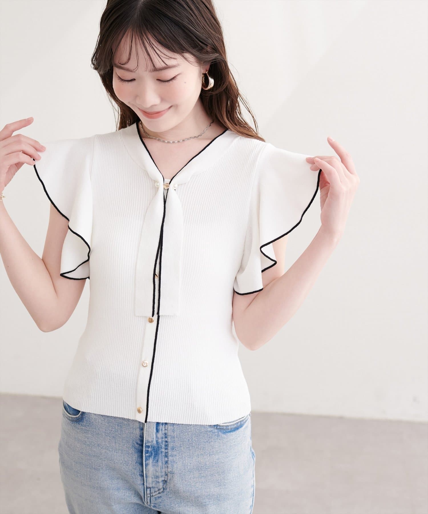 natural couture(ナチュラルクチュール) ラッフルボウタイニット