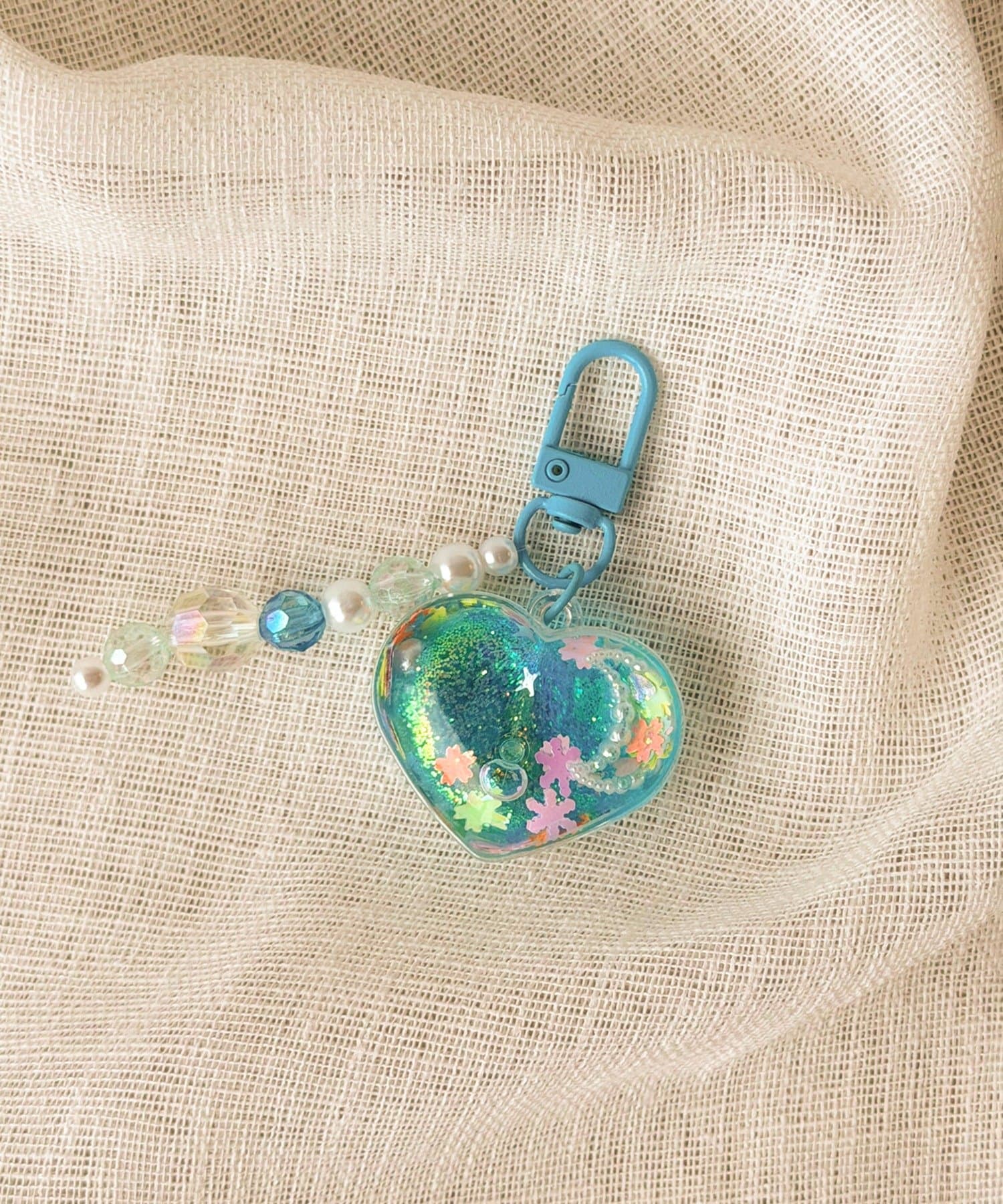 3COINS(スリーコインズ) キラキラアクアキーホルダー