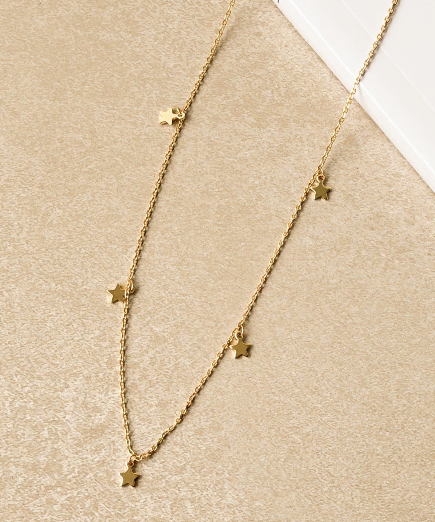 3COINS(スリーコインズ) スターショートネックレス