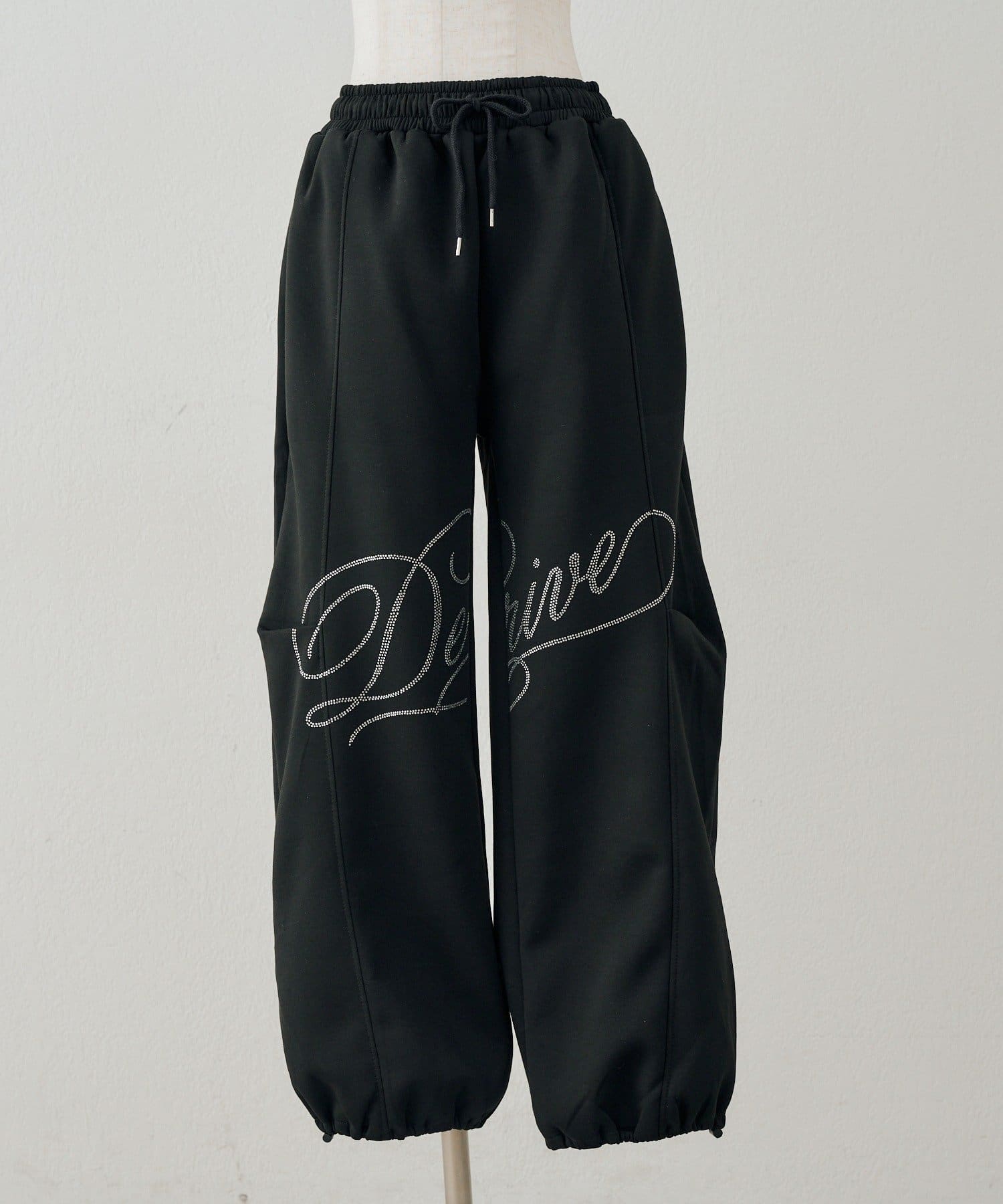 NICE CLAUP / OLIVE des OLIVE OUTLET(ナイスクラップ  / オリーブ デ オリーブ アウトレット) 【continuer】キラキラロゴのスウェットパンツ