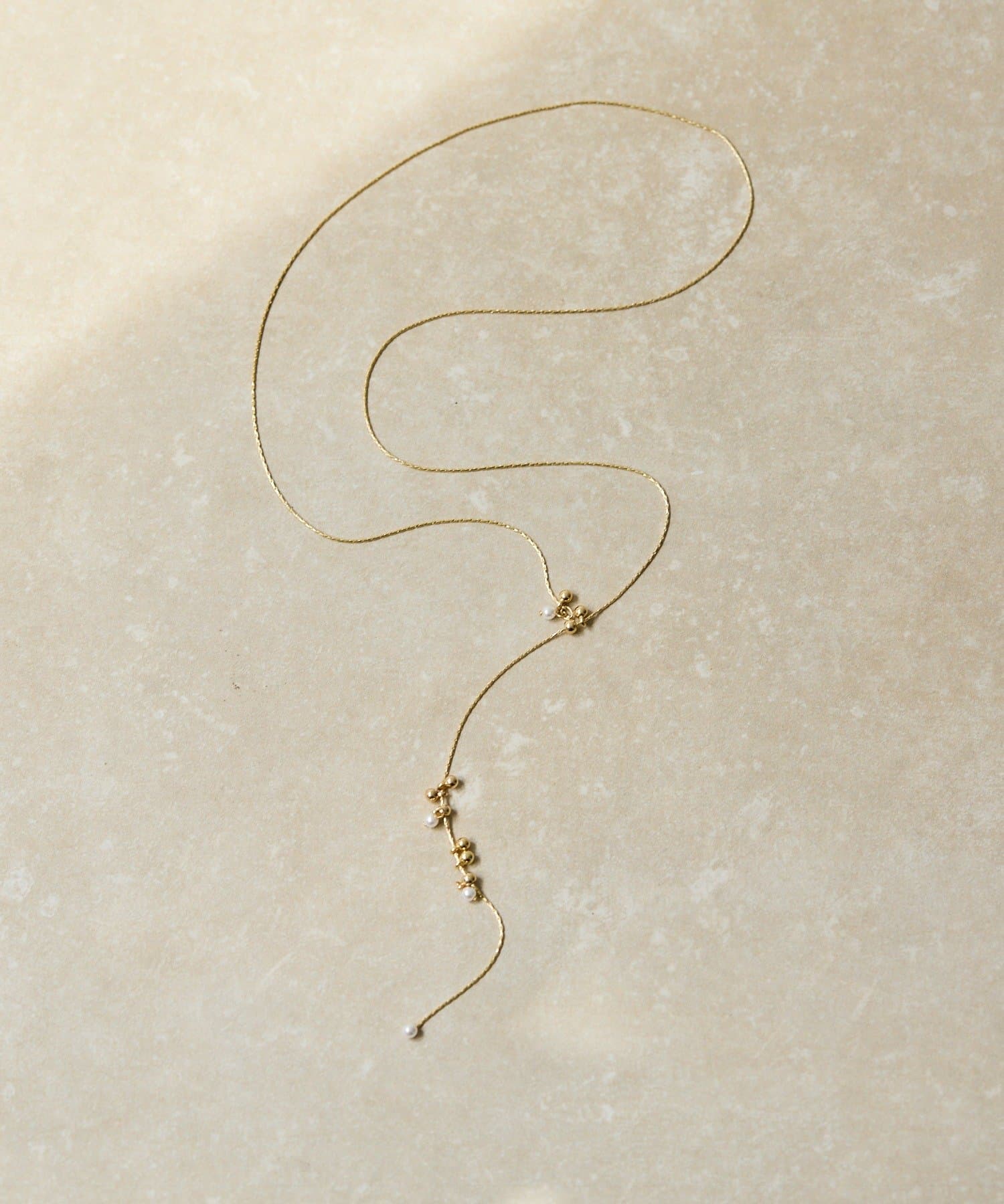 ear PAPILLONNER(イア パピヨネ) 粒々スライドY字ネックレス